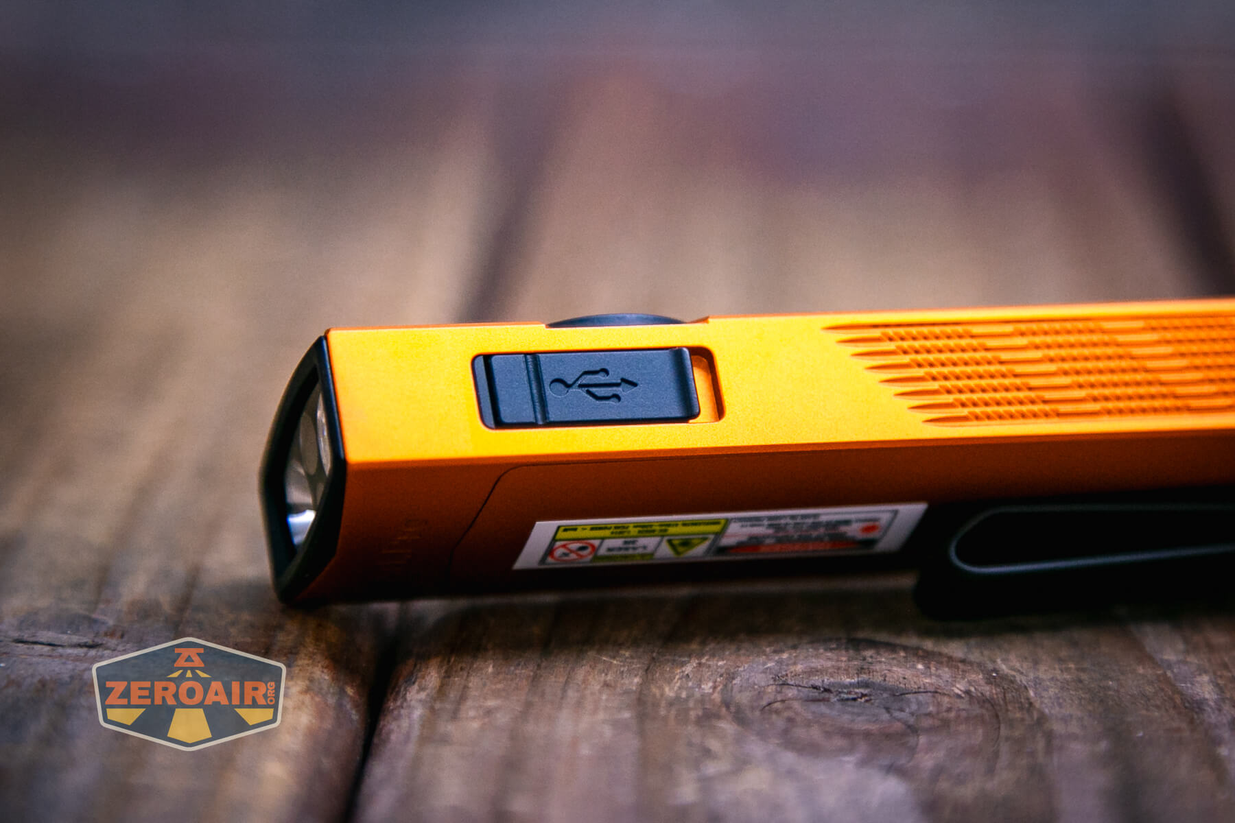 Olight ArkPro Orange flashlight charging port cover