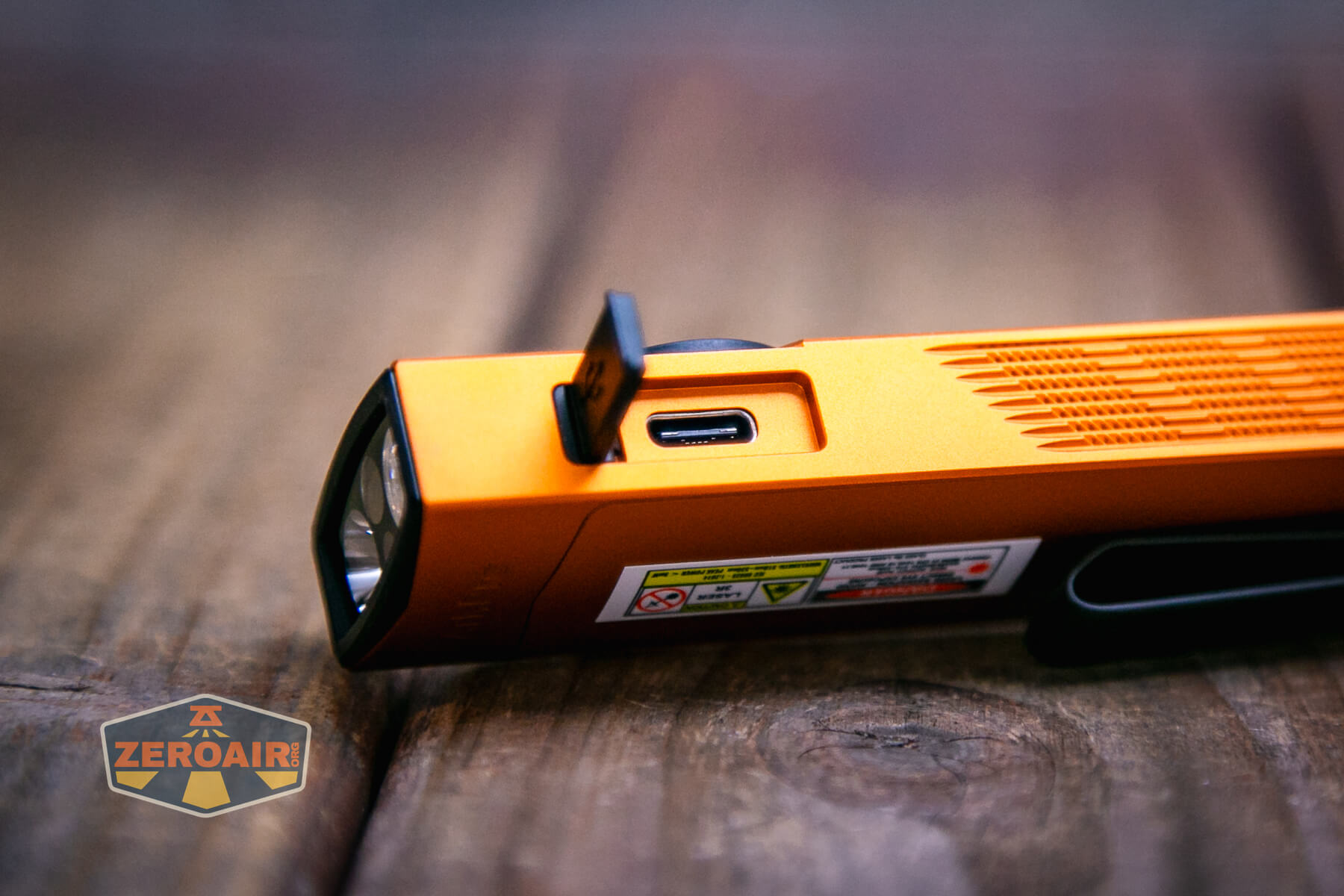 Olight ArkPro Orange flashlight USB-C charging port open
