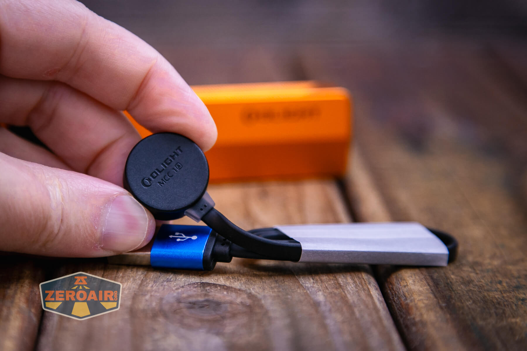 Olight ArkPro Orange flashlight charging base