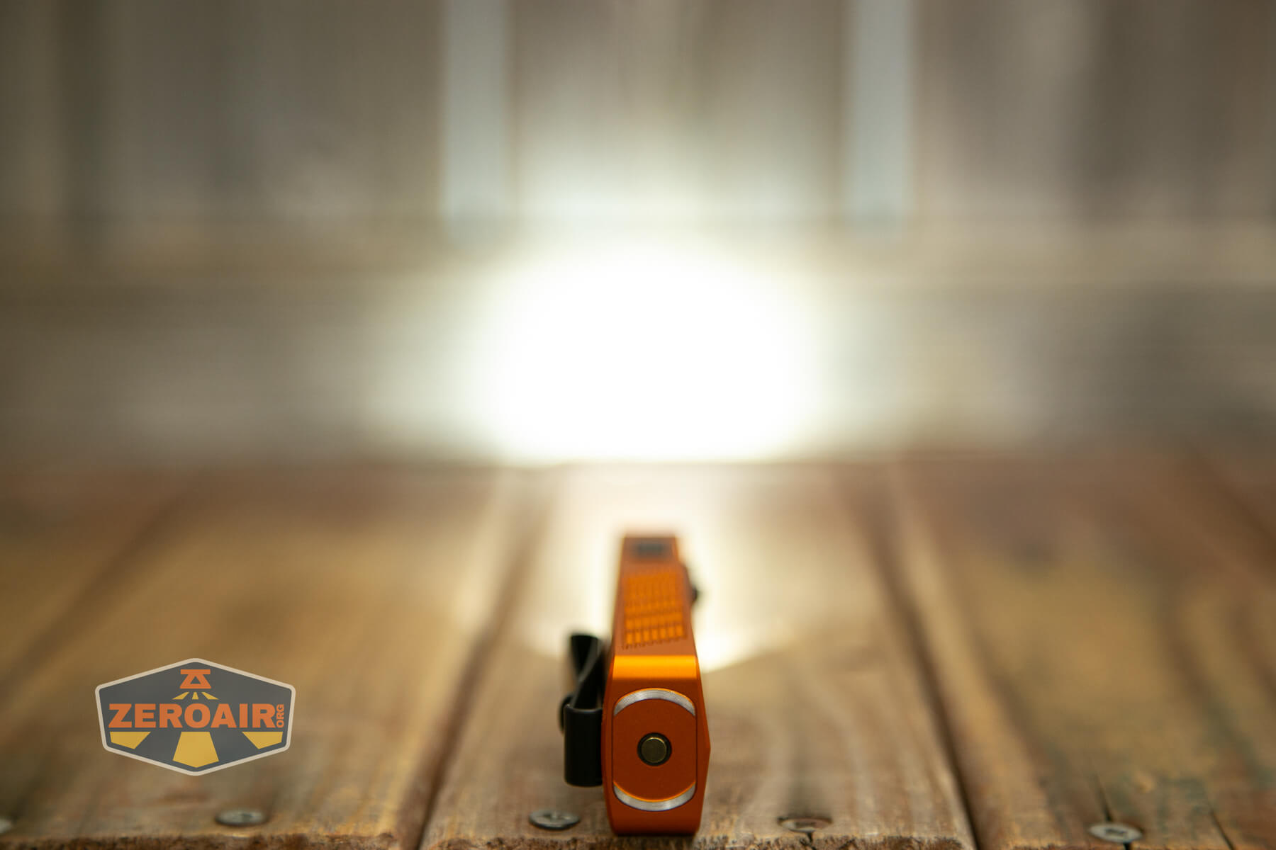 Olight ArkPro Orange flashlight emitters on