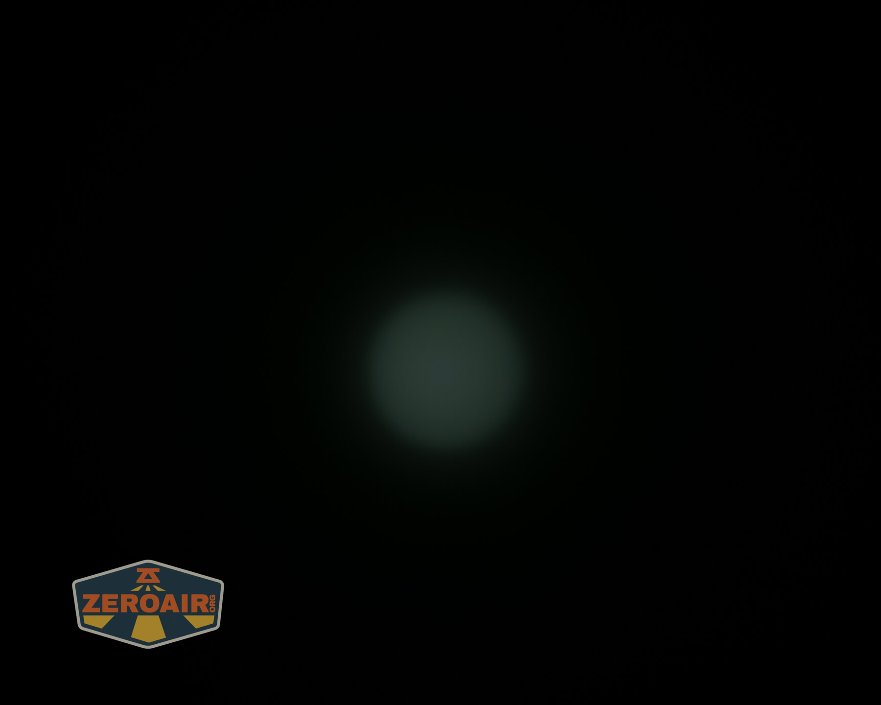 Olight ArkPro Orange flashlight beamshots on ceiling