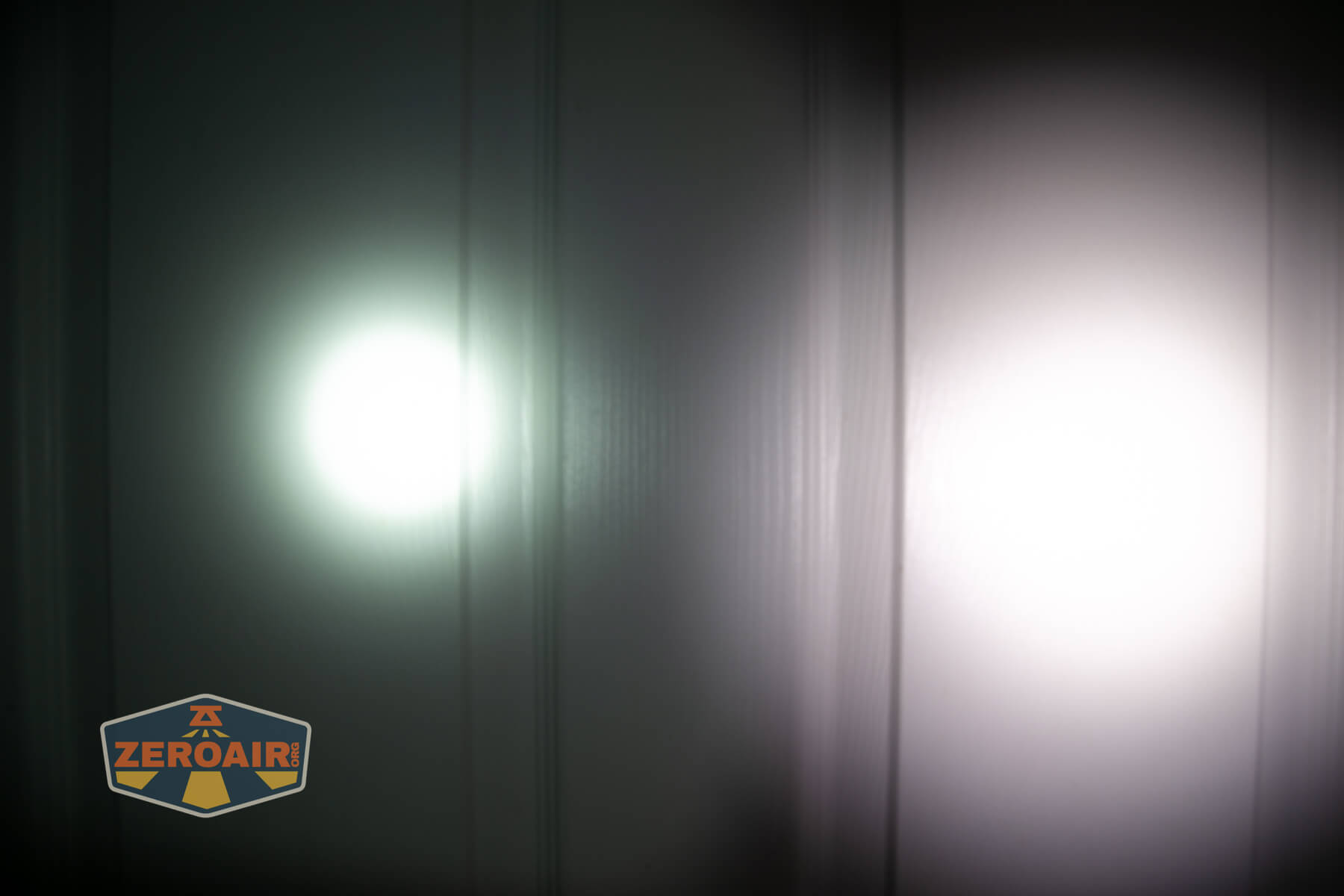 Olight ArkPro Orange flashlight beamshots compared to nichia 219b