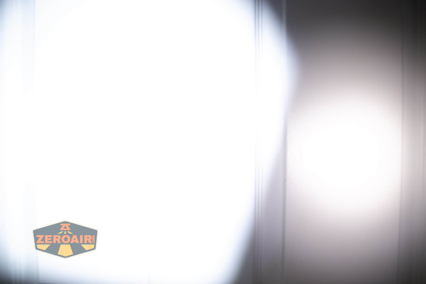 Olight ArkPro Orange flashlight beamshots compared to nichia 219b