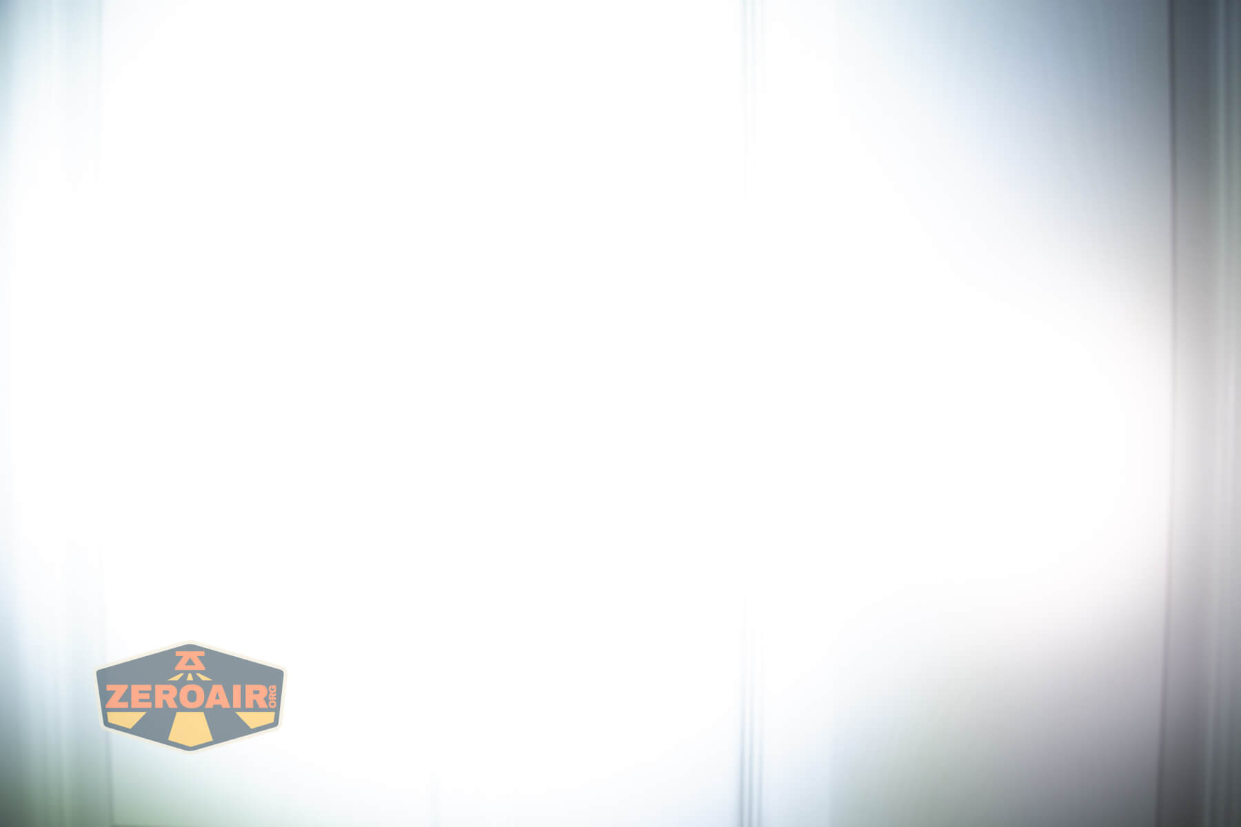 Olight ArkPro Orange flashlight beamshots compared to nichia 219b