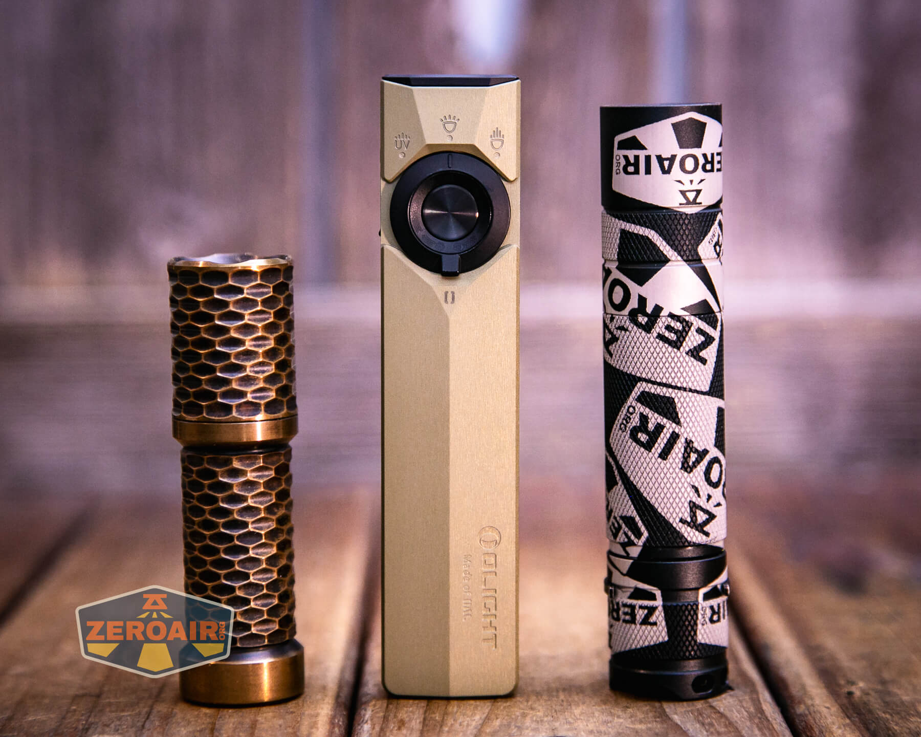 Olight ArkPro Ultra flat edc flashlight with standard-sized flashlights