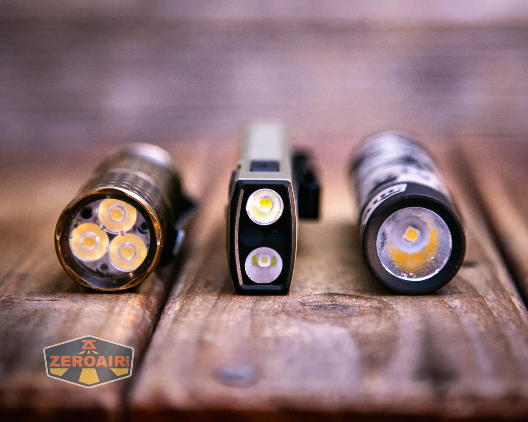 Olight ArkPro Ultra flat edc flashlight with standard-sized flashlights