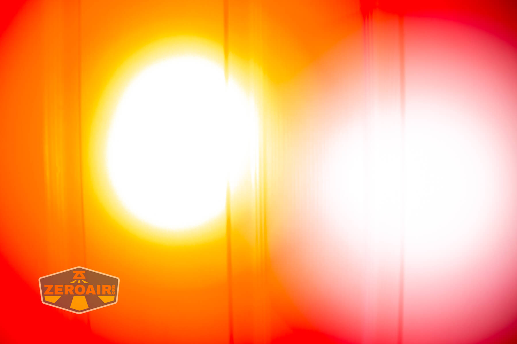 Olight Marauder Mini 2 Compact powerful flashlight beamshots on door compared to nichia 219b