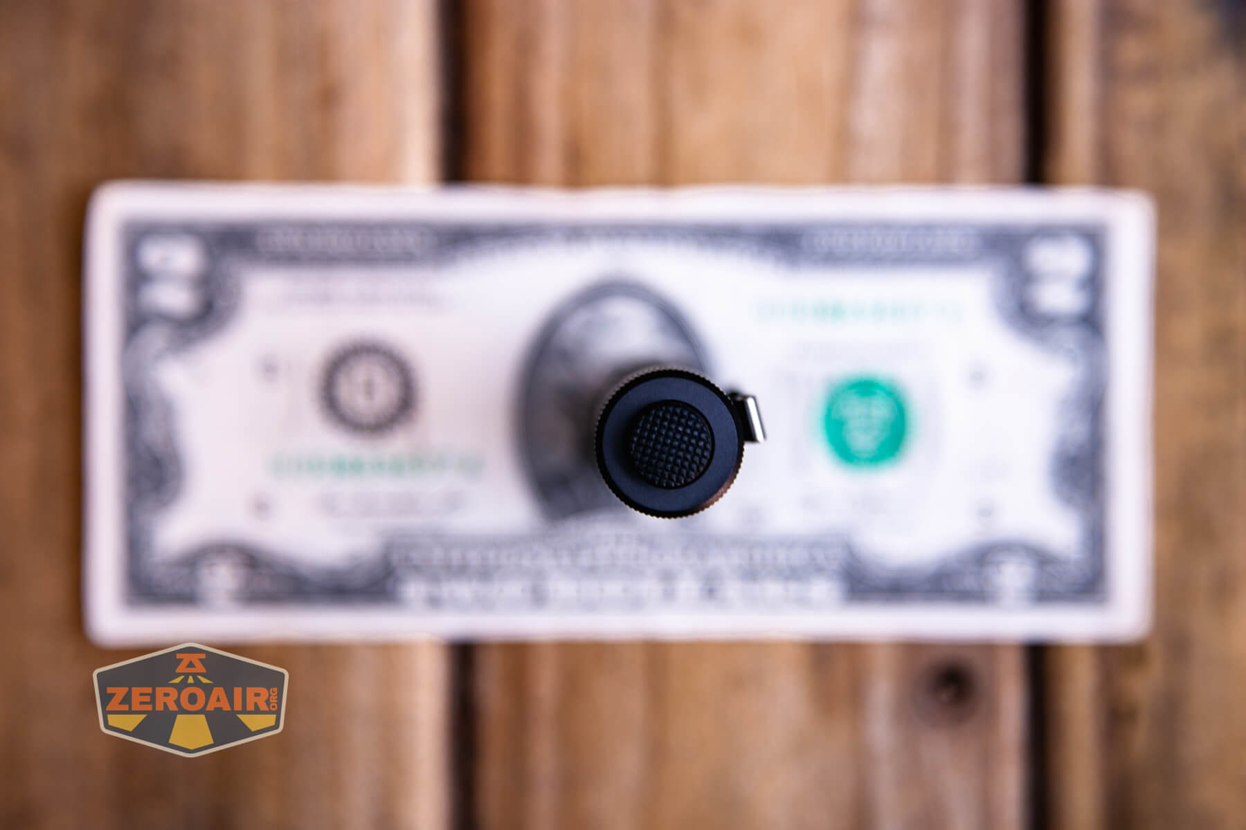 Ripshine EL1 14500 flashlight on two dollar bill