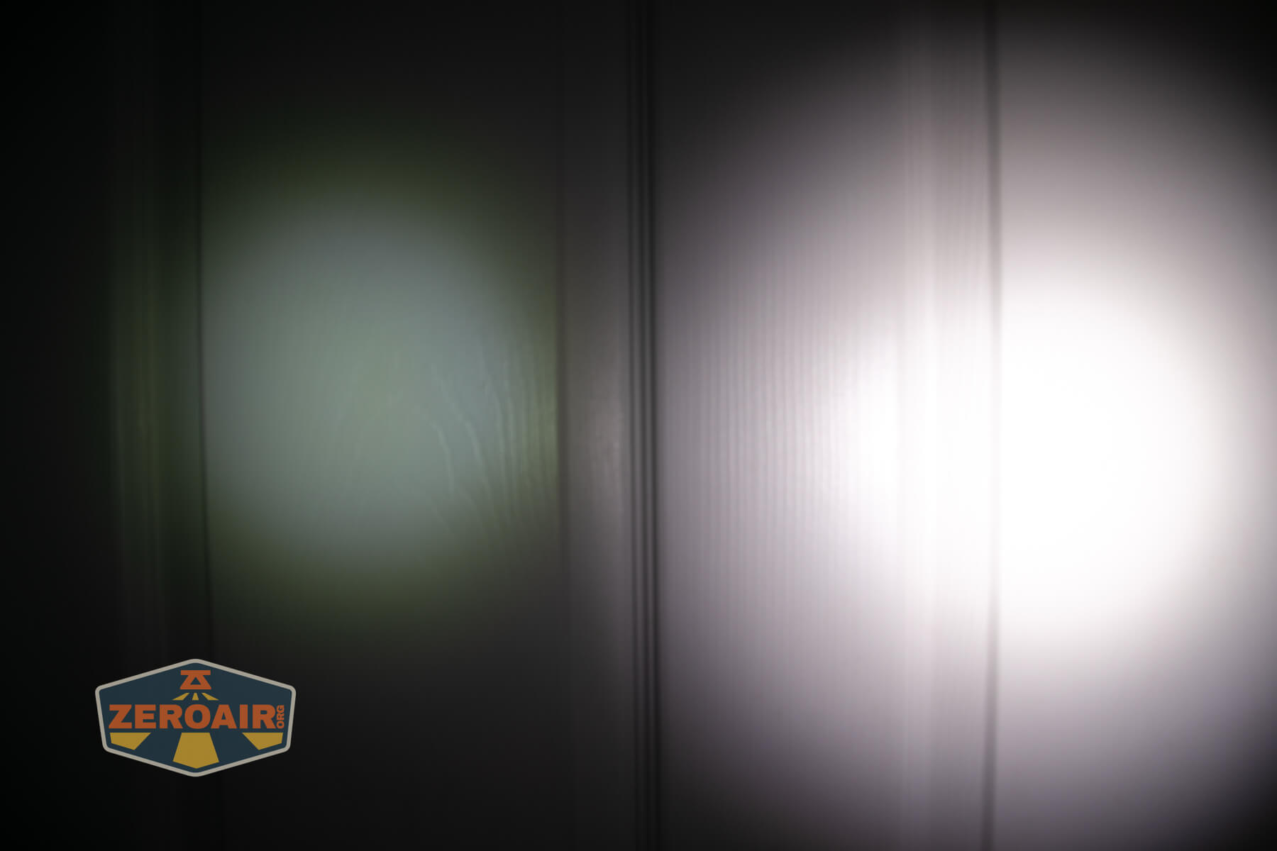 Ripshine EL1 14500 flashlight beamshots on door compared to nichia 219b