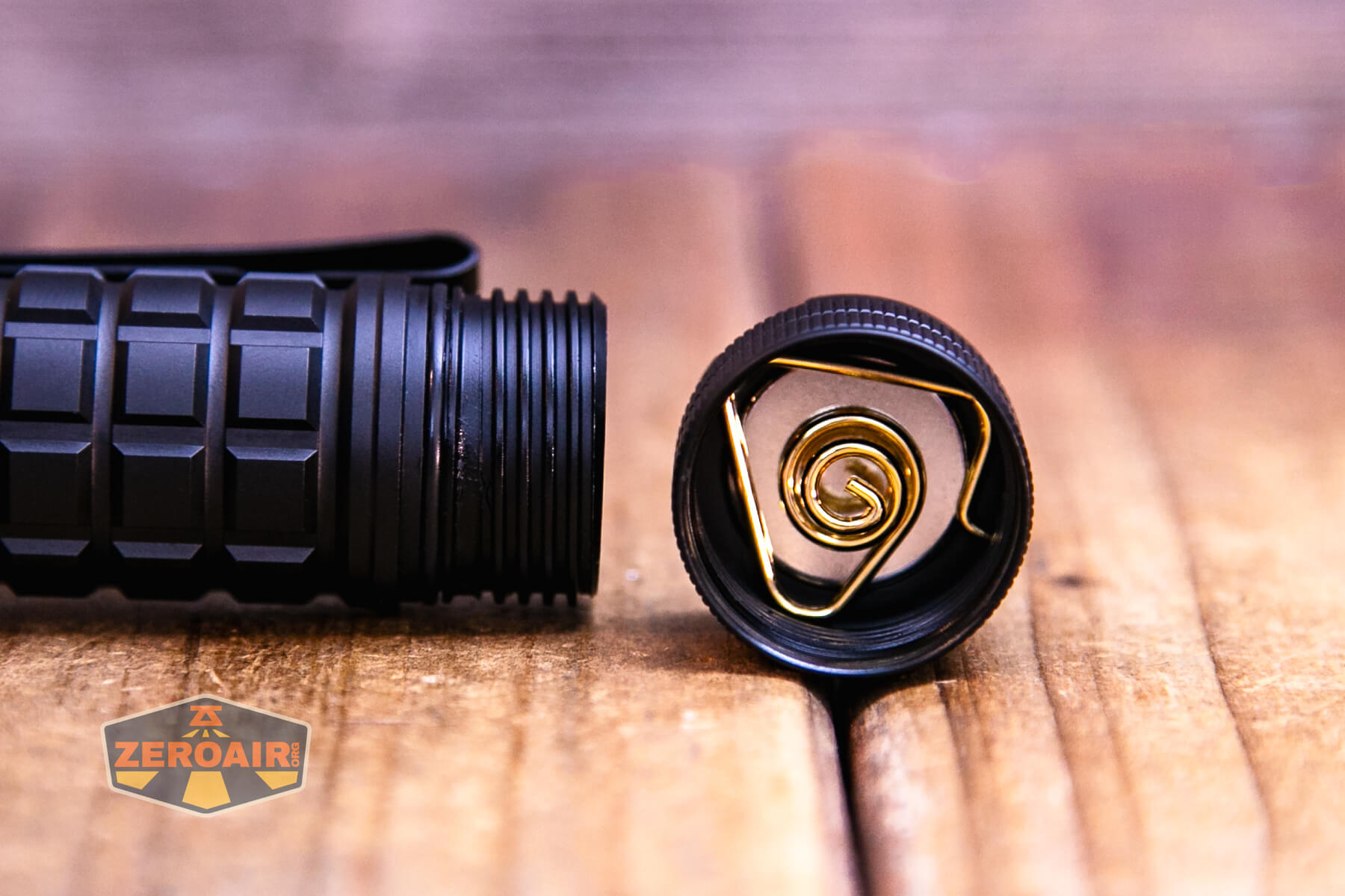 Ripsshine OF1 flashlight tailcap off showing threads and magnet