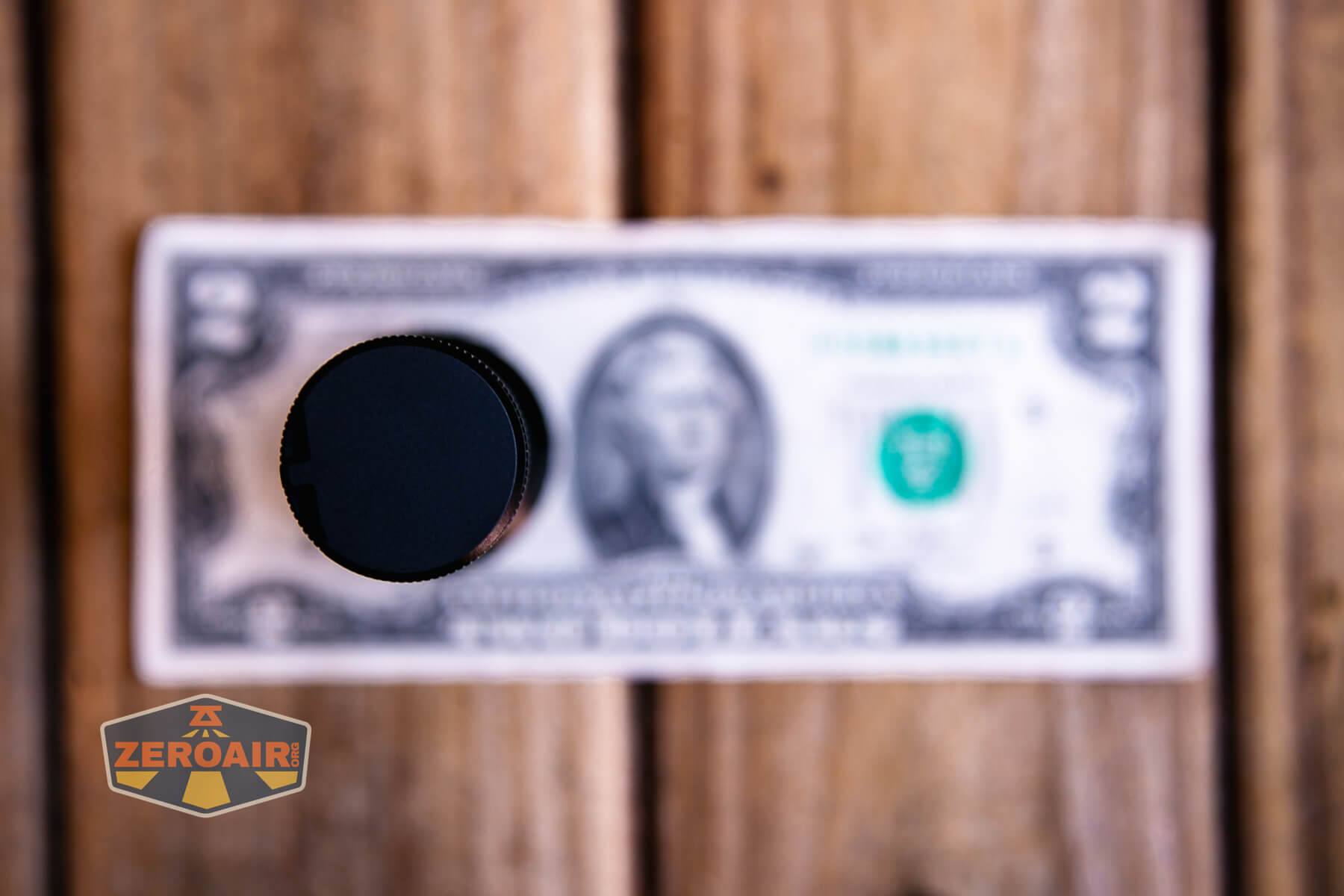 Ripsshine OF1 flashlight on a two dollar bill