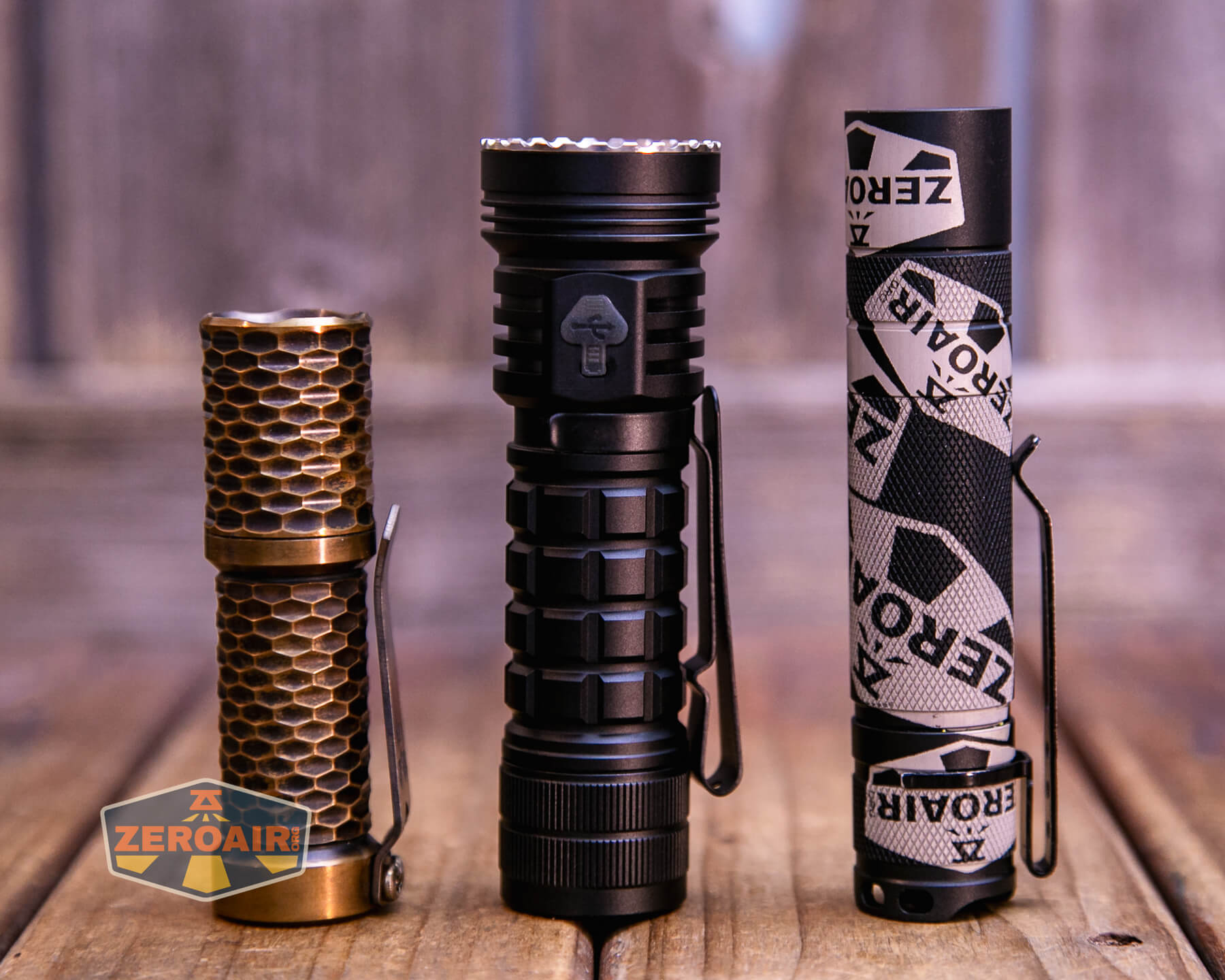 Ripsshine OF1 flashlight with two standard sized flashlights