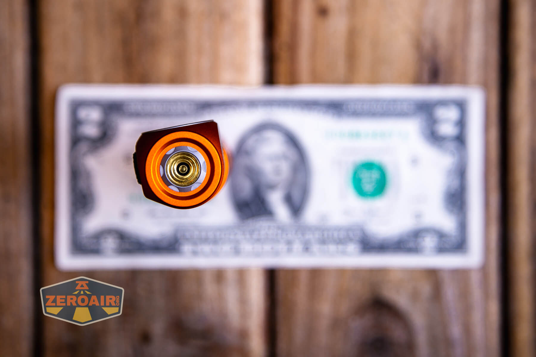 Skilhunt H300R v4 headlamp on two dollar bill