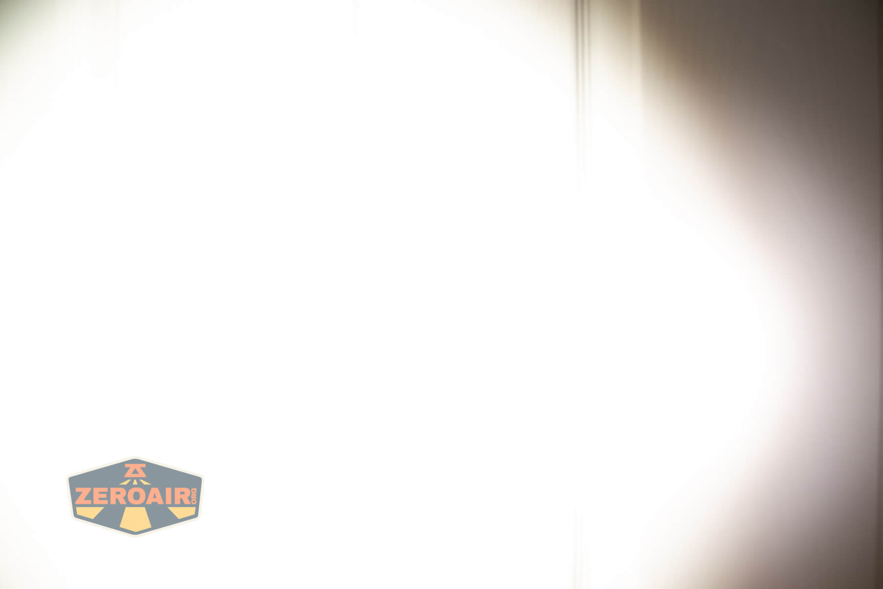 Skilhunt H300R v4 headlamp beamshots on door compared to nichia 219b