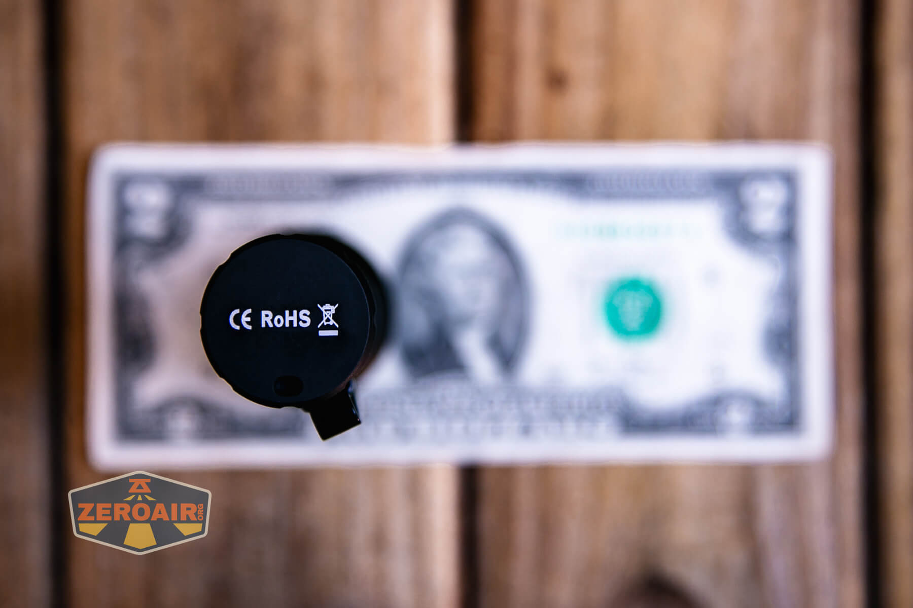 Wurkkos TS28 flashlight on a two dollar bill