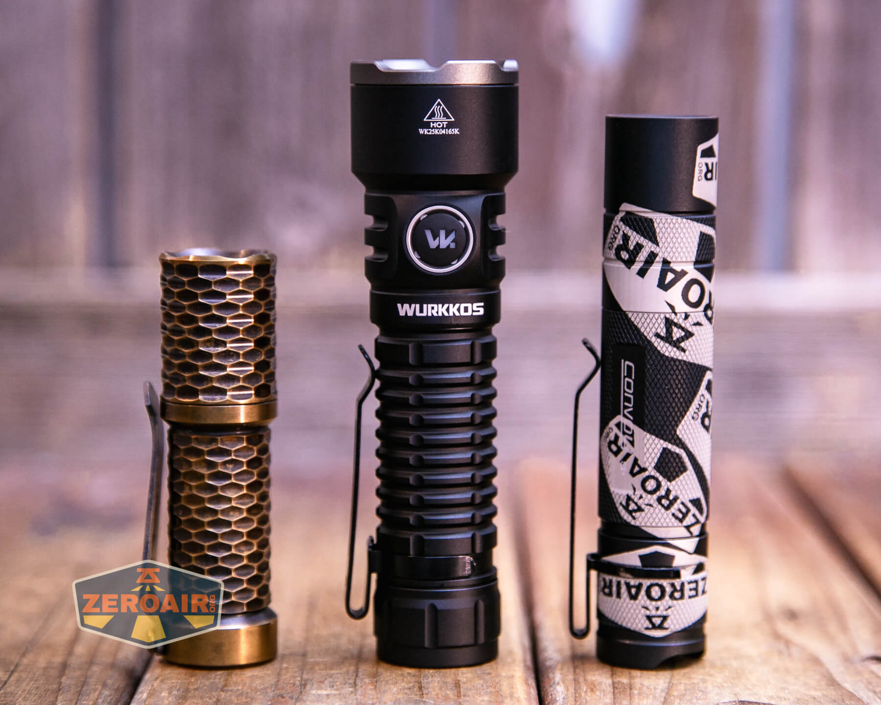 Wurkkos TS28 flashlight with two standard sized flashlights