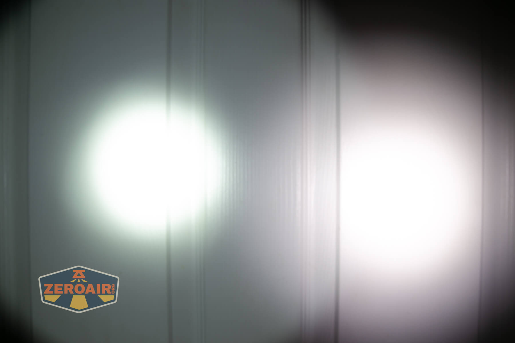 Wurkkos TS28 flashlight beamshots on door (at 1') compared to nichia 219b 4500K