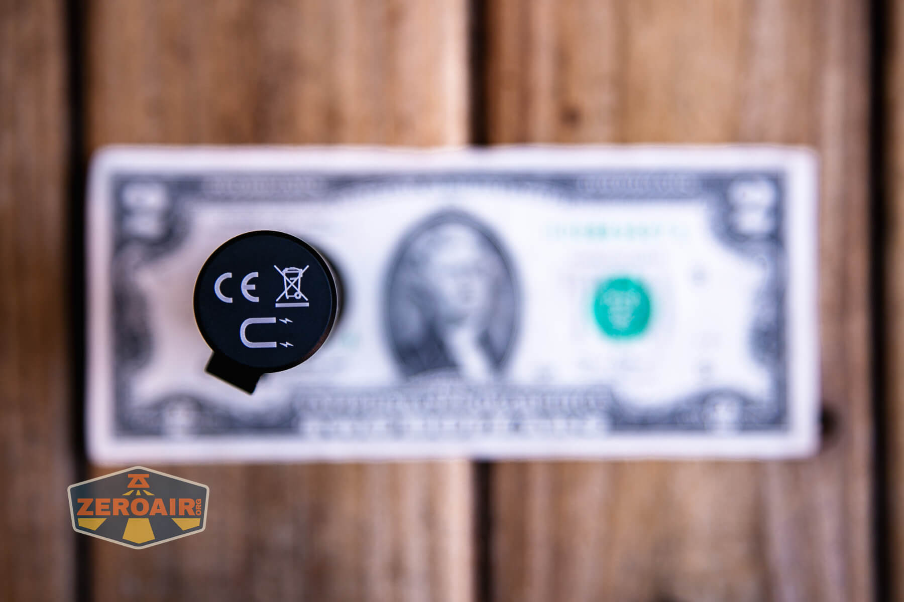 Acebeam EC20 multi-light source edc flashlight on a two dollar bill