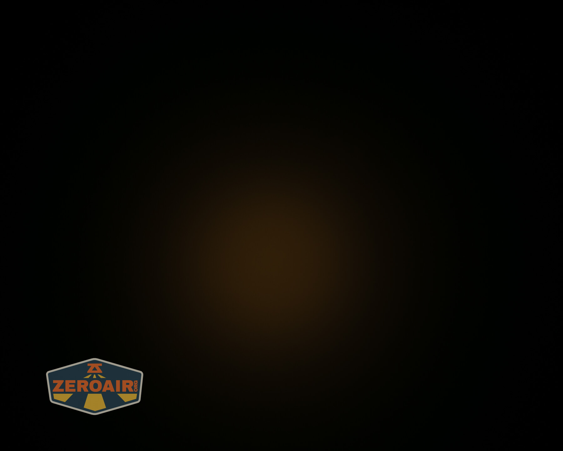 A dim, circular brownish light is visible in the center of a mostly black background. The ZeroAir logo appears in the bottom left corner.