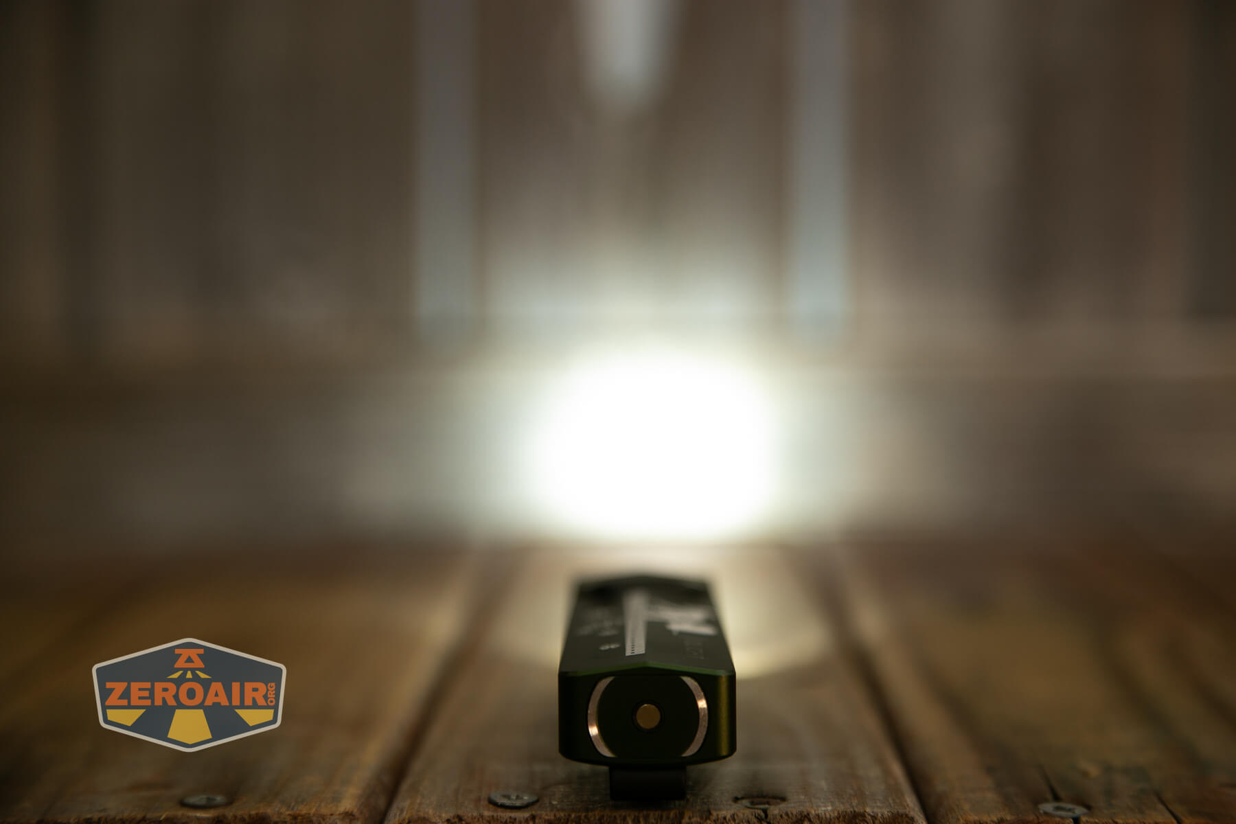 Olight ArkPro Christmas 2025 flat flashlight spot emitter on