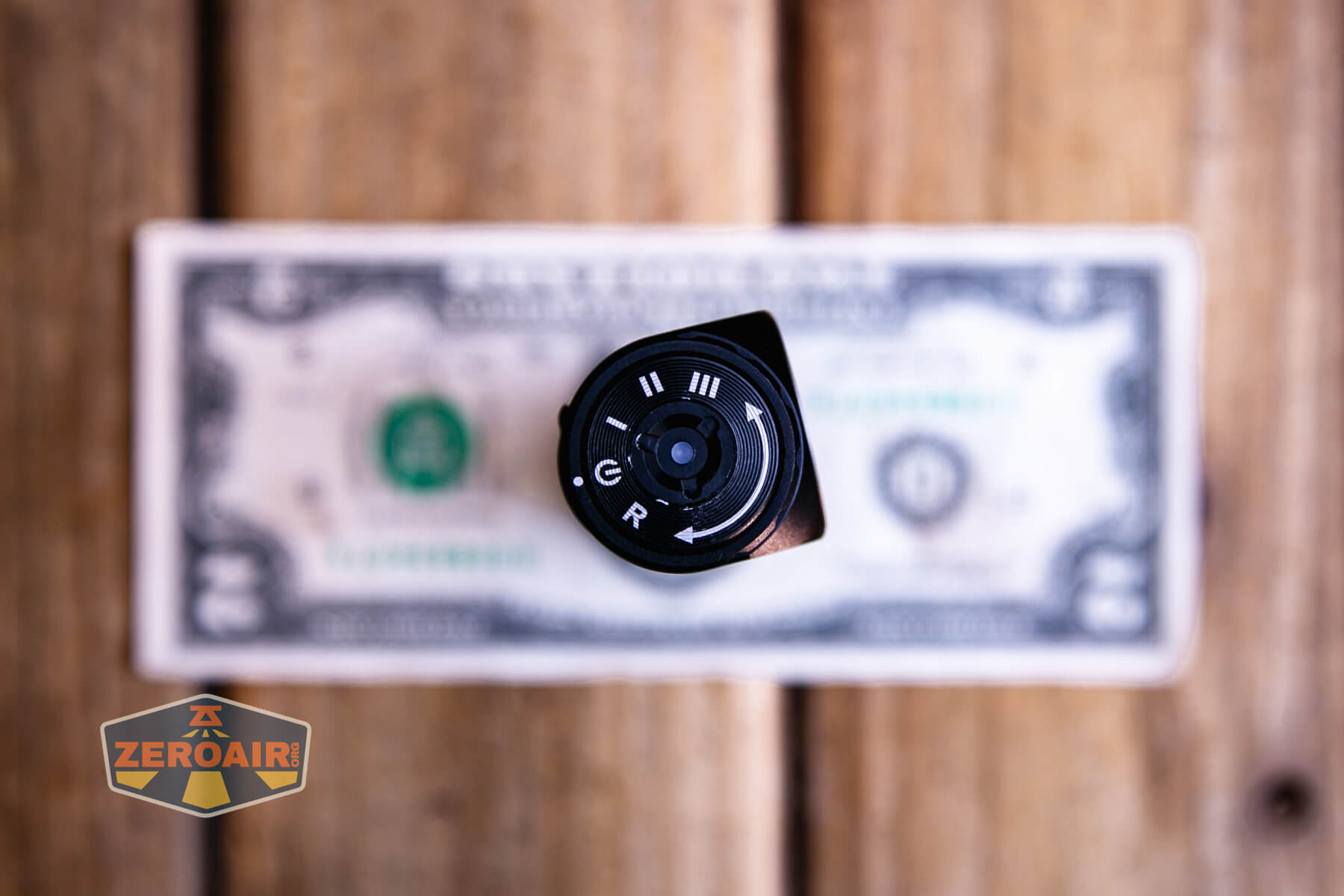 Sofirn HS43 headlamp on a two dollar bill