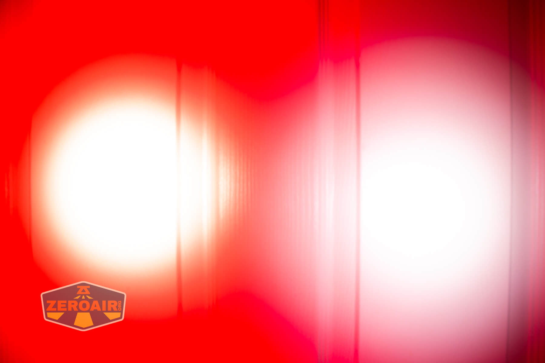 Sofirn HS43 headlamp beamshots on door (at 1') compared to nichia 219b 4500K