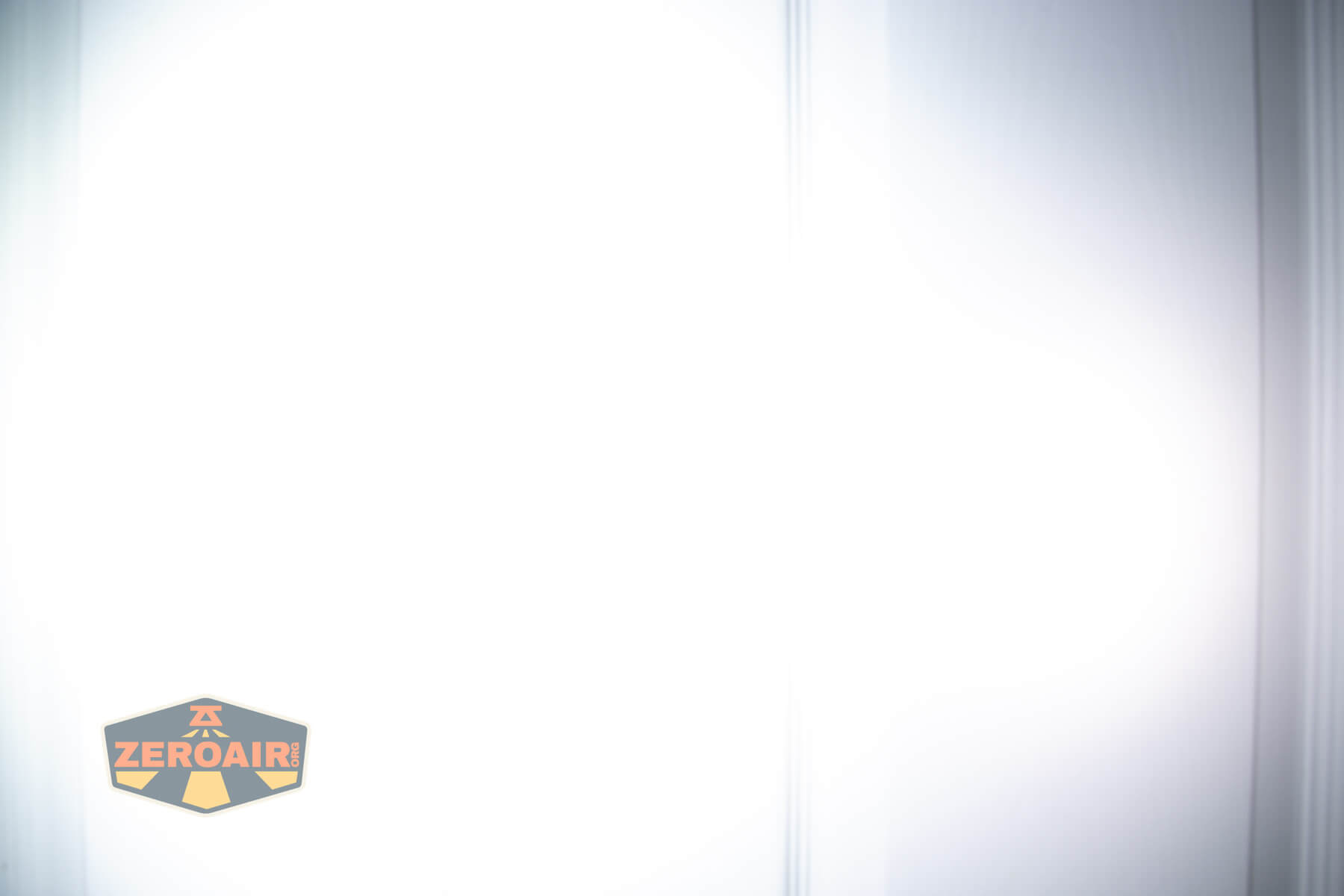 Sofirn HS43 headlamp beamshots on door (at 1') compared to nichia 219b 4500K