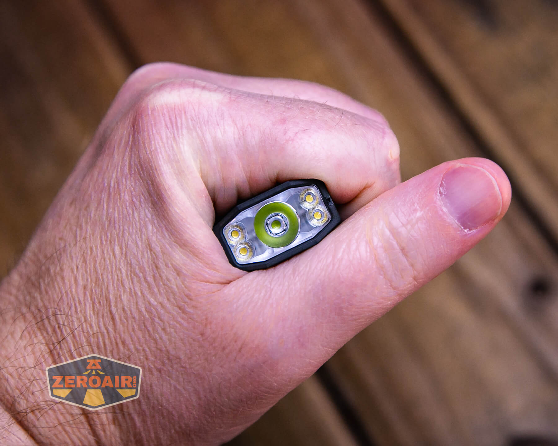 SOFIRN ST1 rechargeable flat EDC flashlight in hand