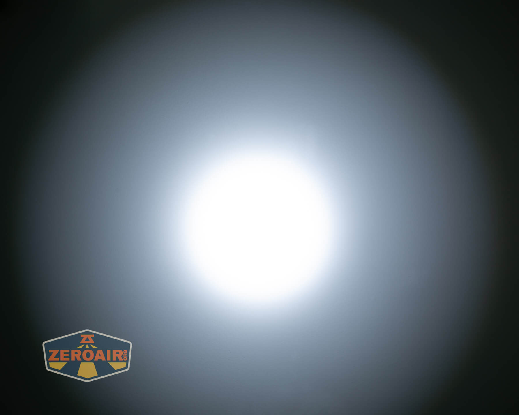 SOFIRN ST1 rechargeable flat EDC flashlight beamshots on ceiling