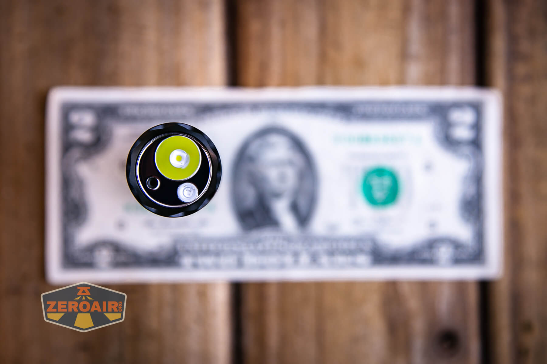 Acebeam K1 EDC flashlight on a two dollar bill