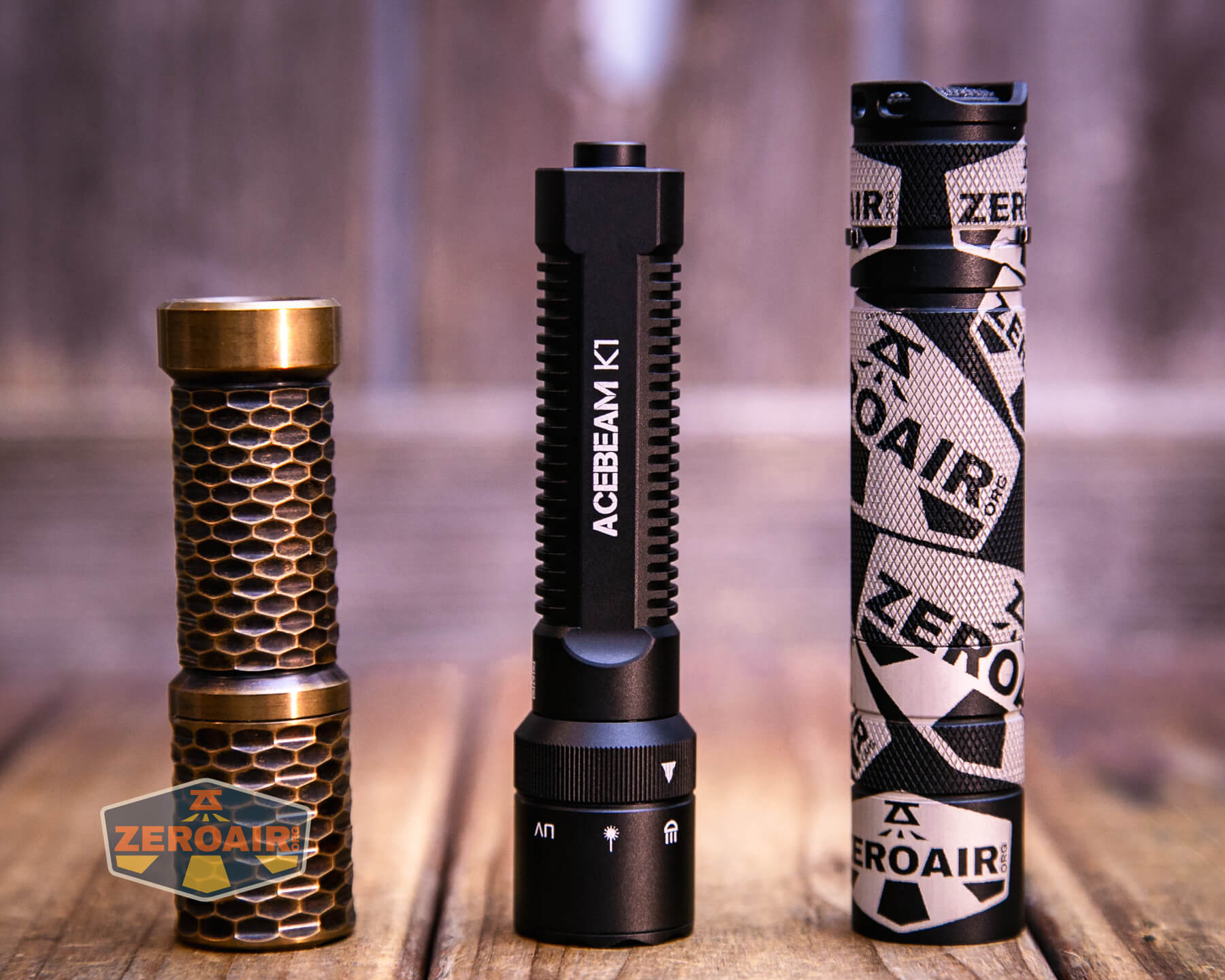 Acebeam K1 EDC flashlight with two standard sized flashlights