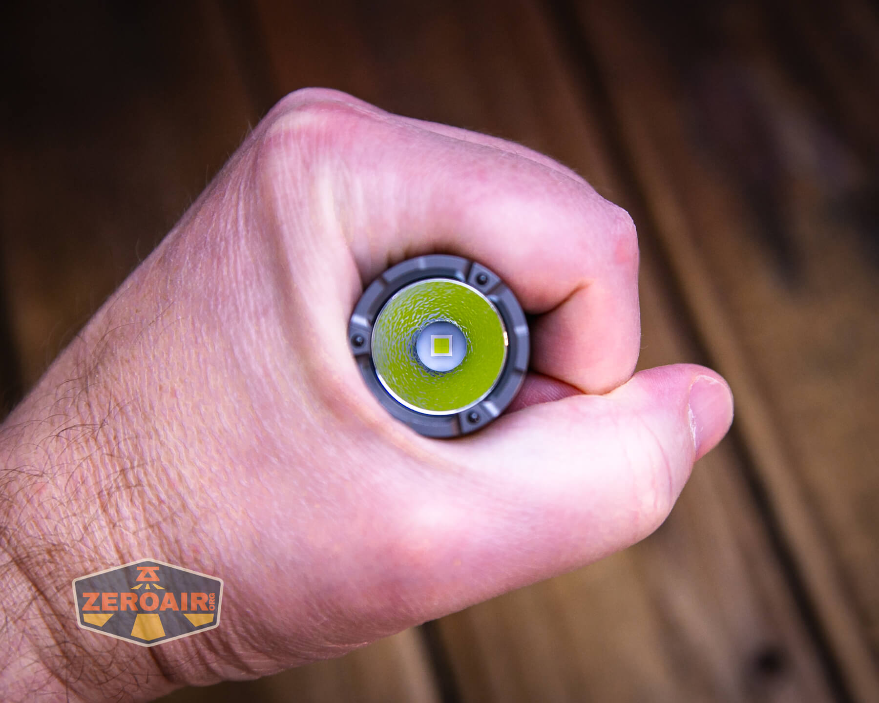 Nextorch Artorch compact EDC tactical flashlight in hand