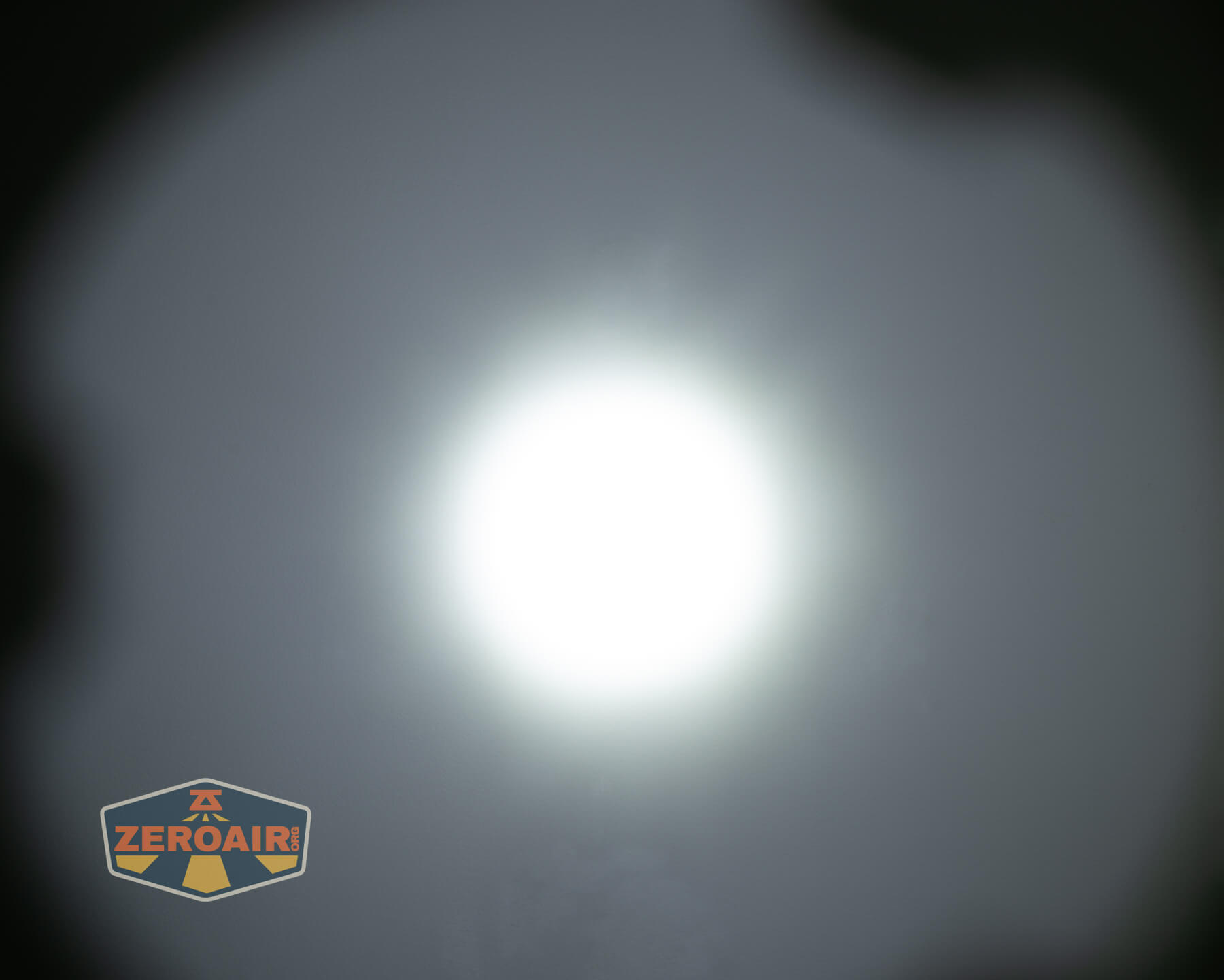 Nextorch Artorch compact EDC tactical flashlight beamshots on ceiling