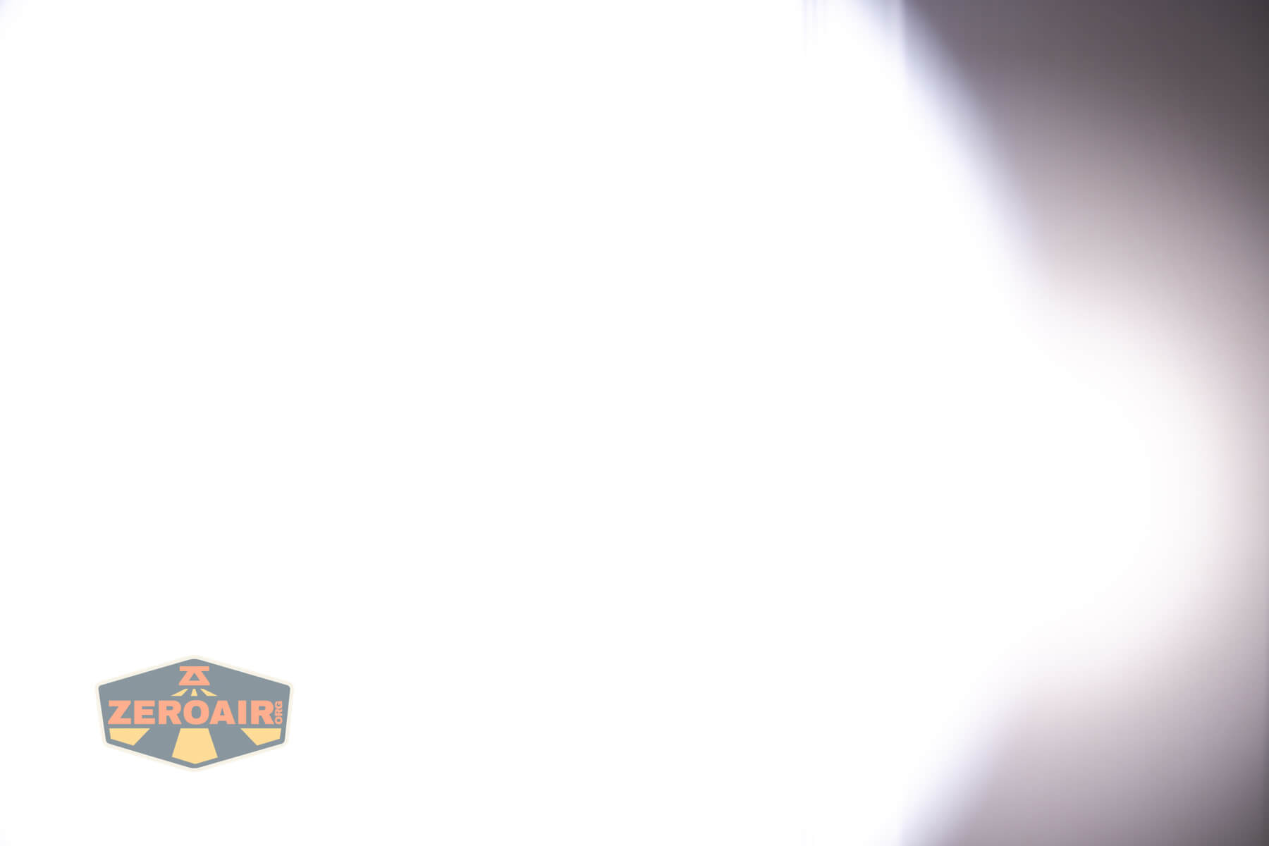 RovyVon E10 Pro flashlight beamshots on door compared to nichia 219b