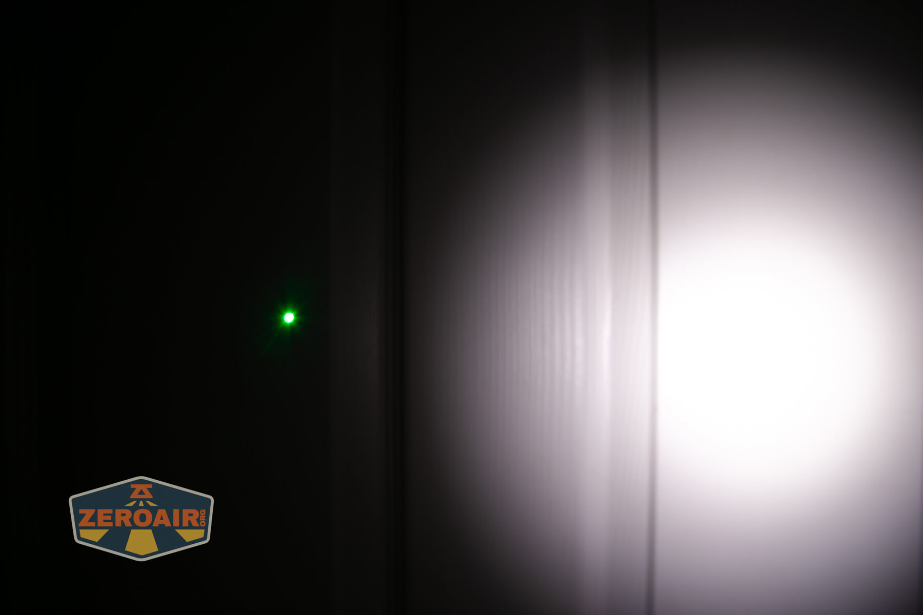 RovyVon E10 Pro flashlight beamshots on door compared to nichia 219b