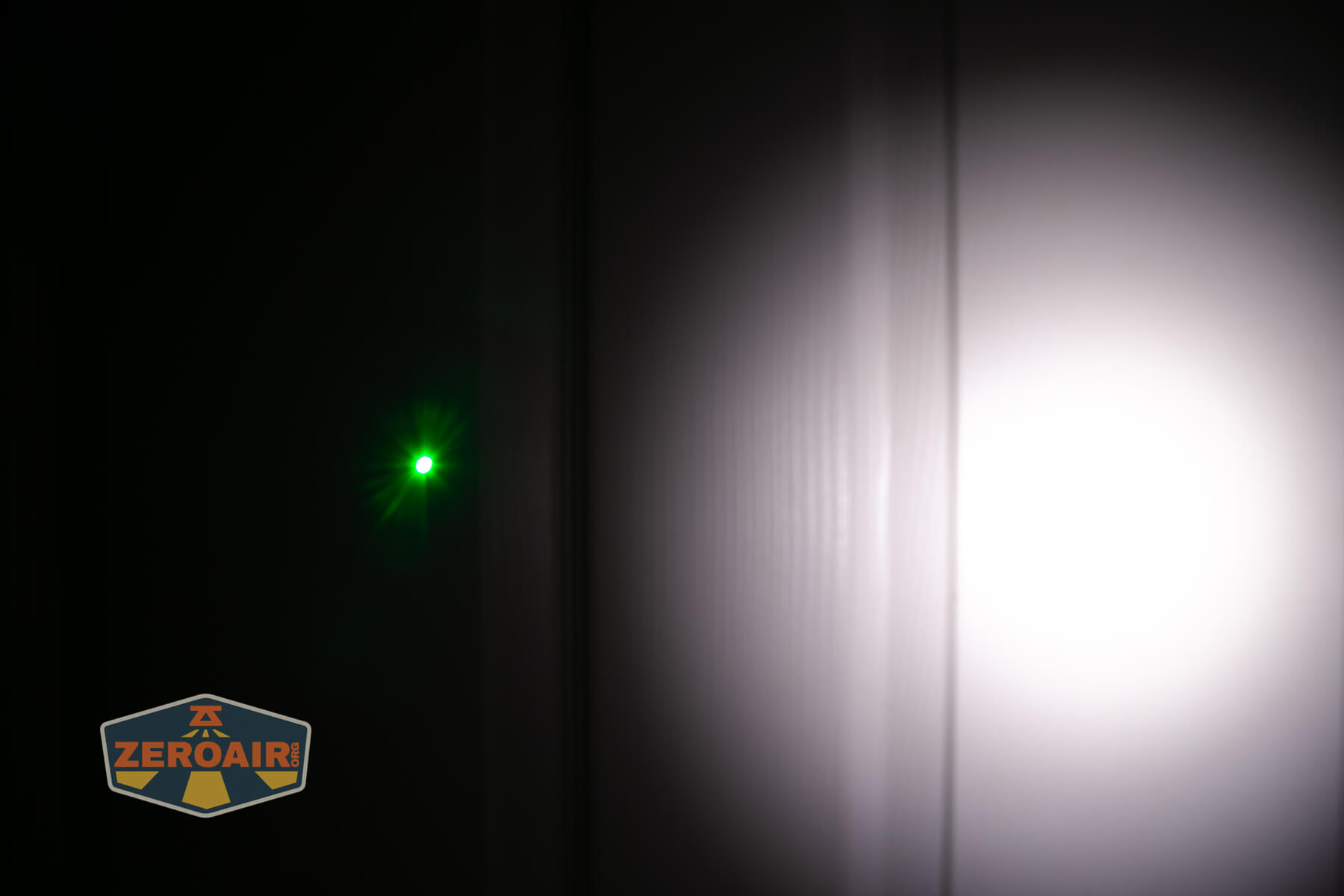 RovyVon E10 Pro flashlight beamshots on door compared to nichia 219b