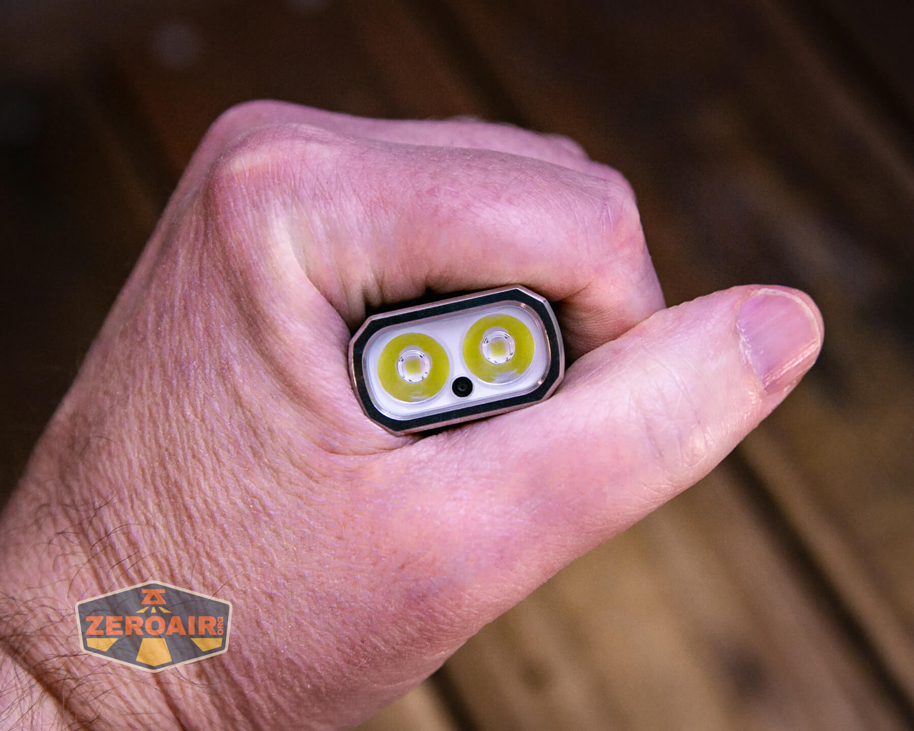 Trustfire Mini X3 Pro EDC multi-function flashlight in hand