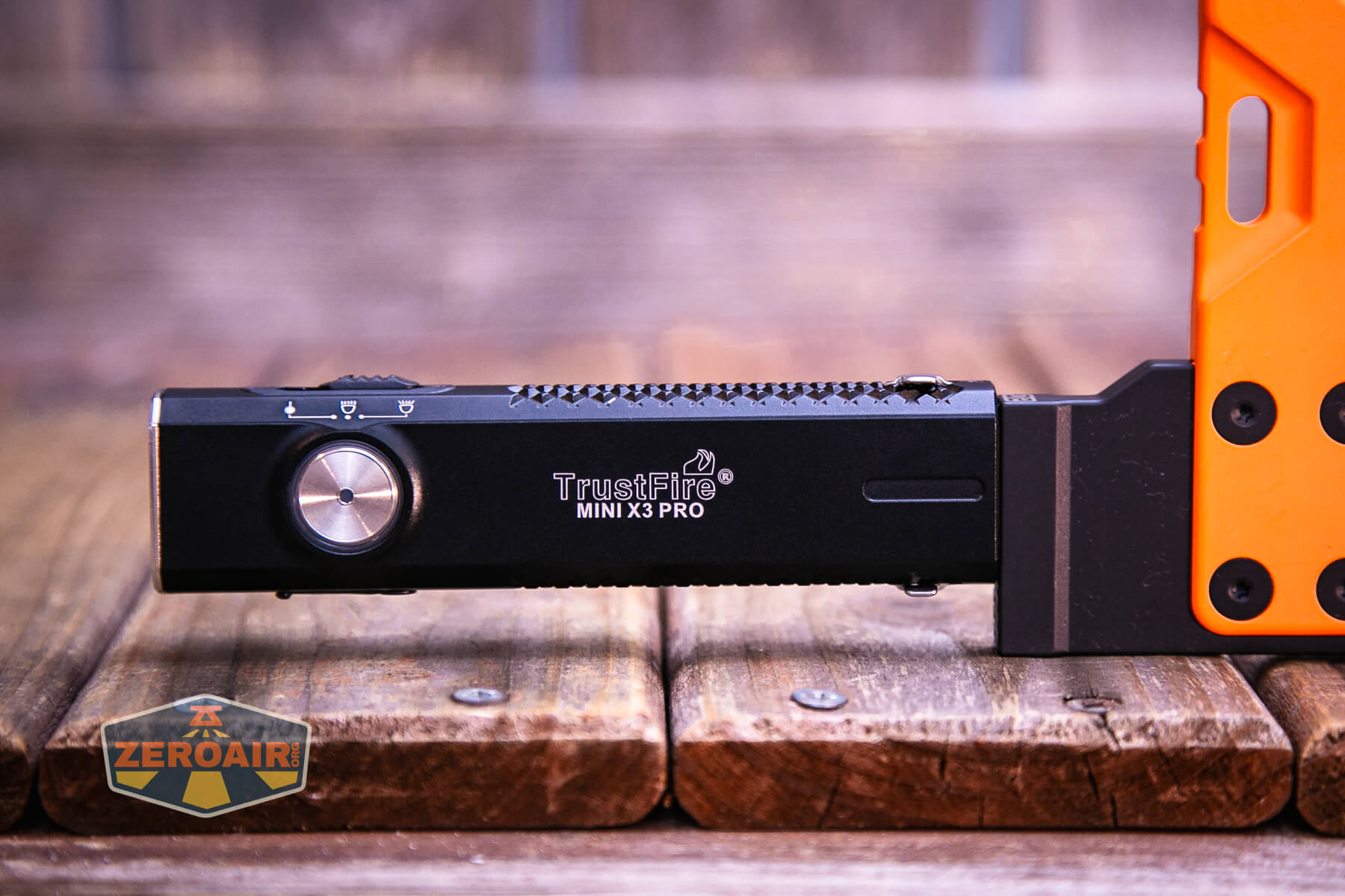 Trustfire Mini X3 Pro EDC multi-function flashlight magnet in use