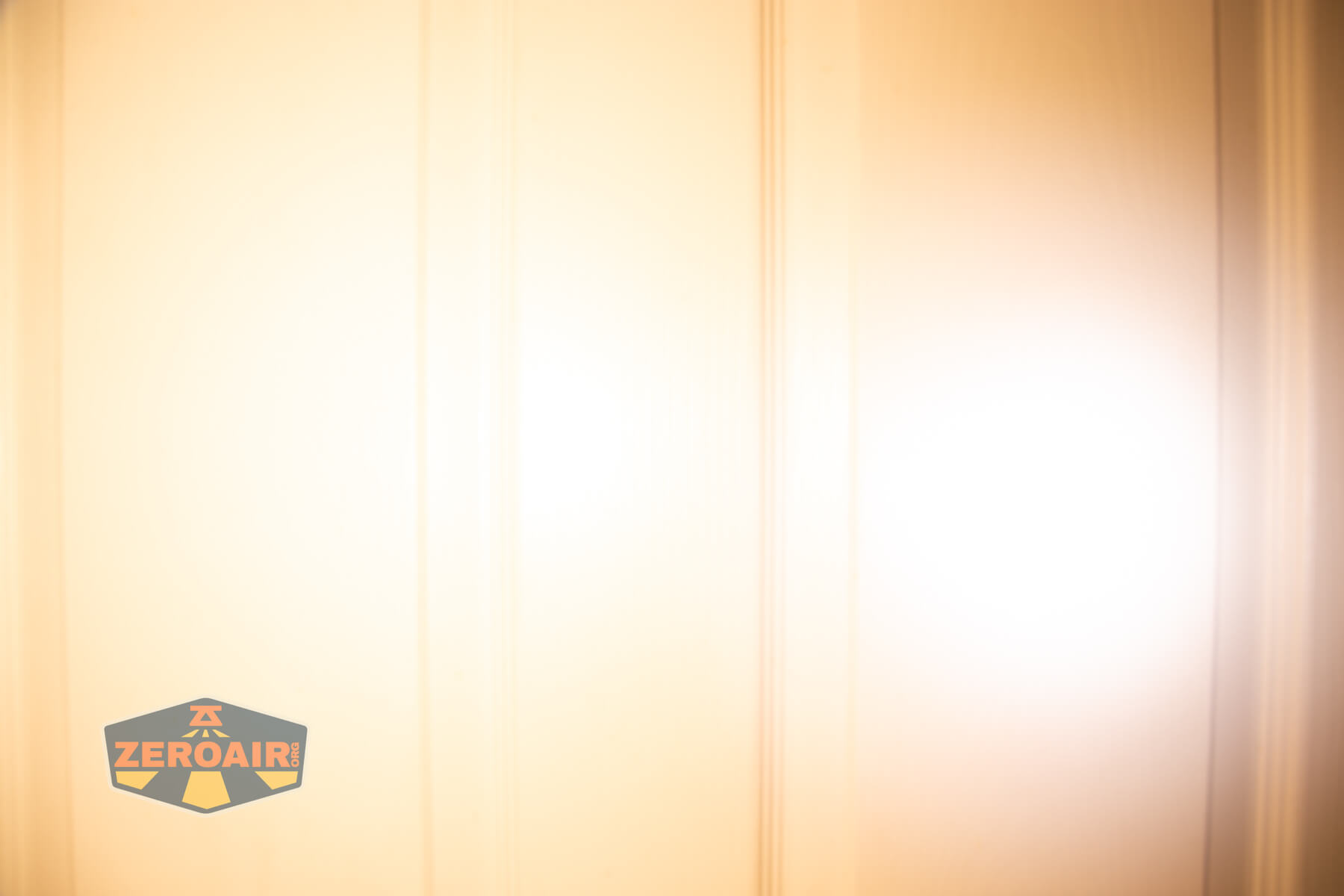 Trustfire Mini X3 Pro EDC multi-function flashlight beamshots on door (at 1') compared to nichia 219b 4500K