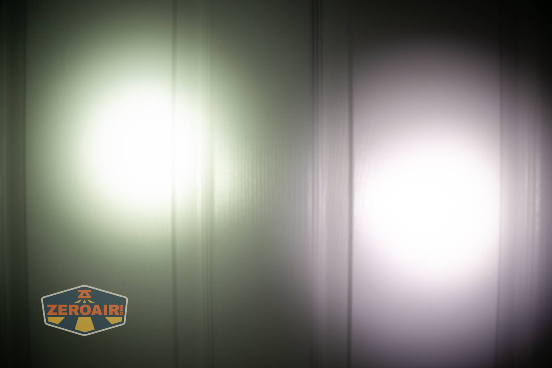 Trustfire Mini X3 Pro EDC multi-function flashlight beamshots on door (at 1') compared to nichia 219b 4500K