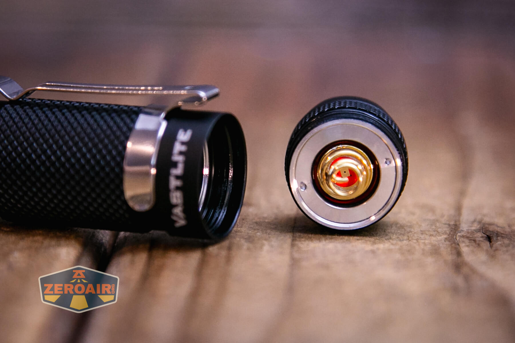 Vastlite Minima BOW LED flashlight tailcap off showing spring