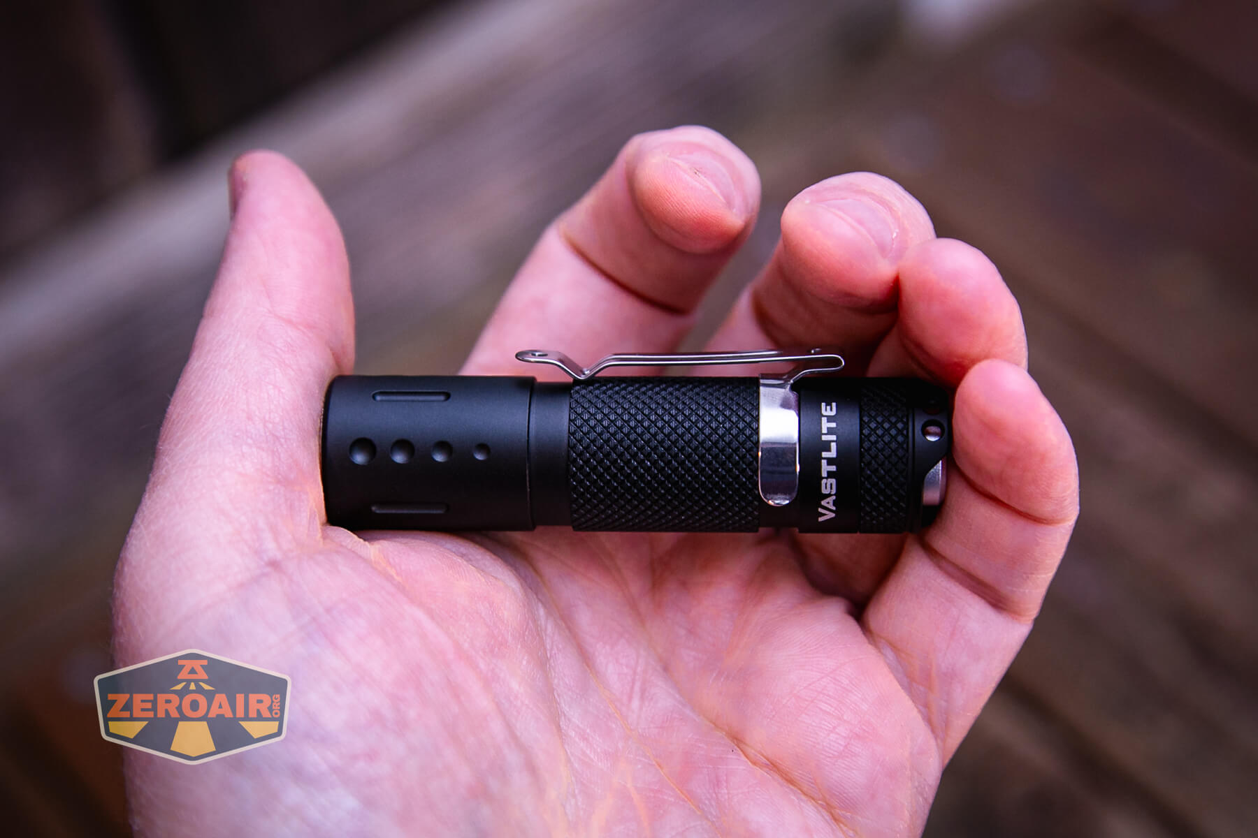 Vastlite Minima BOW LED flashlight in hand