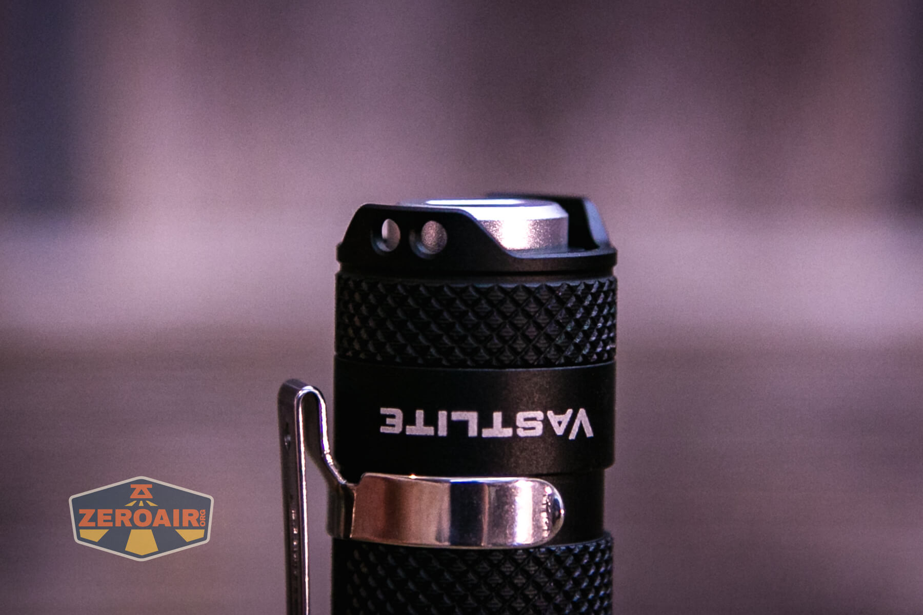 Vastlite Minima BOW LED flashlight switch profile and lanyard holes