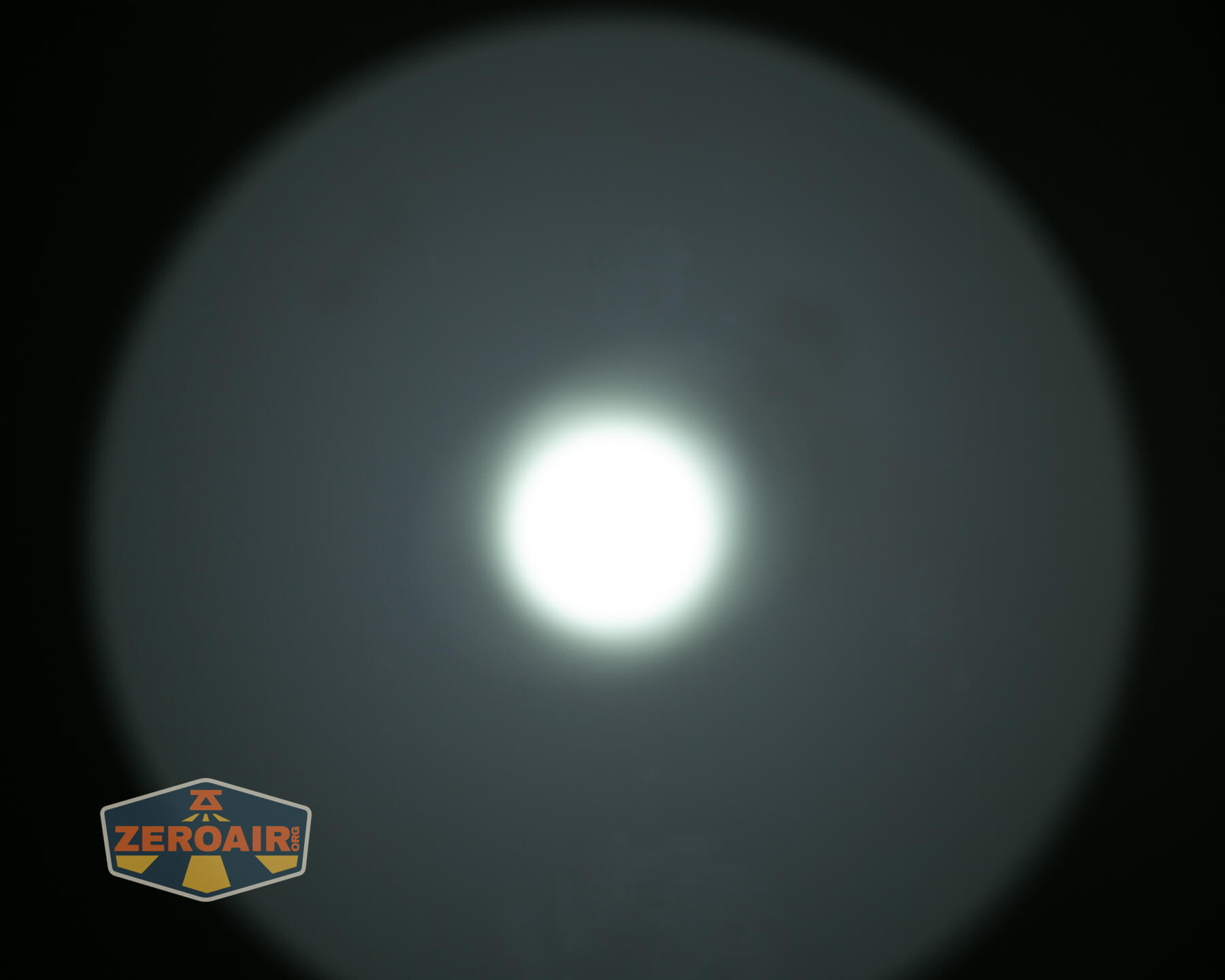 Armytek Barracuda Pro Max searchlight beamshots on ceiling