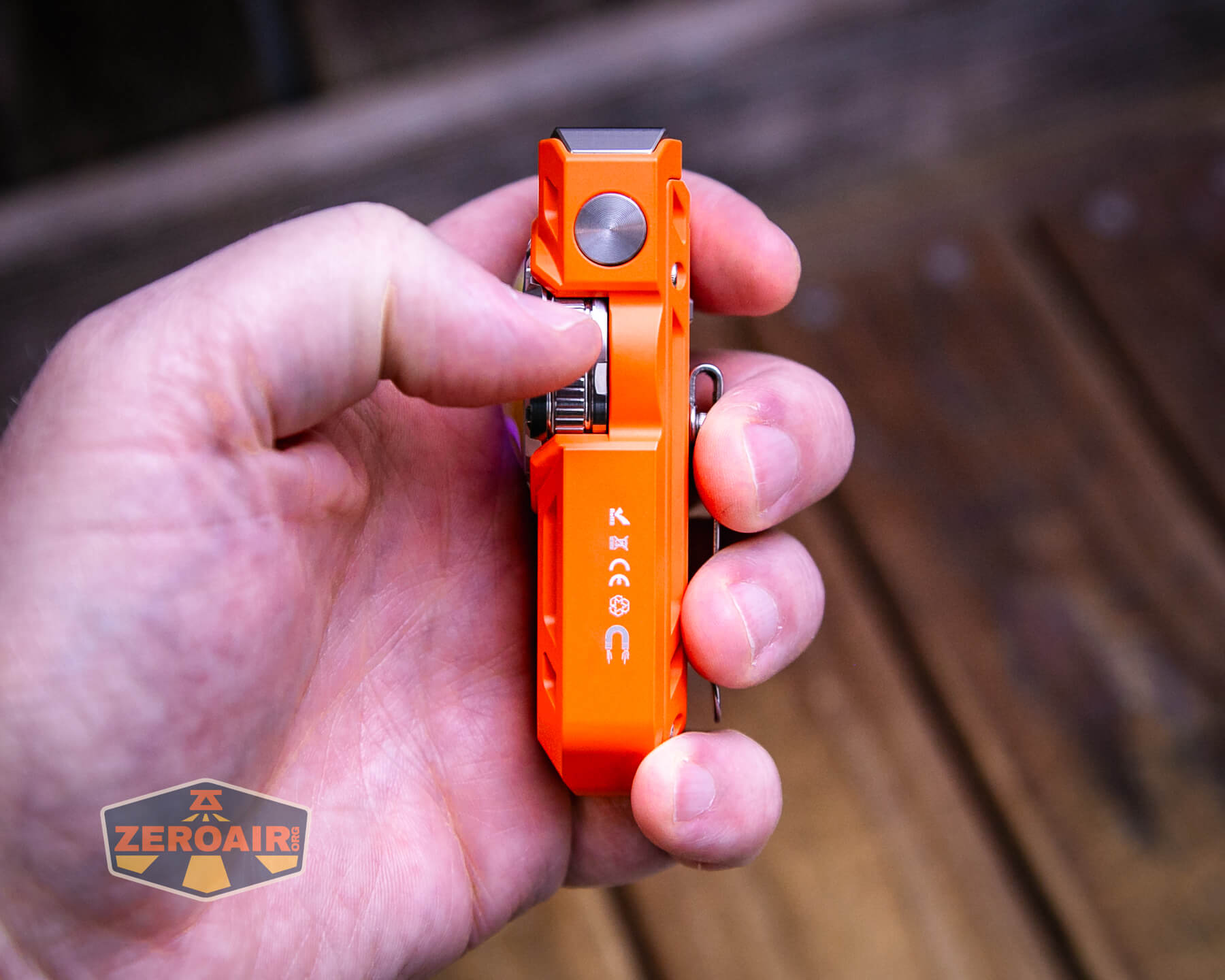 Mateminco TACUBE 3.0 multi-function RGB flashlight in hand