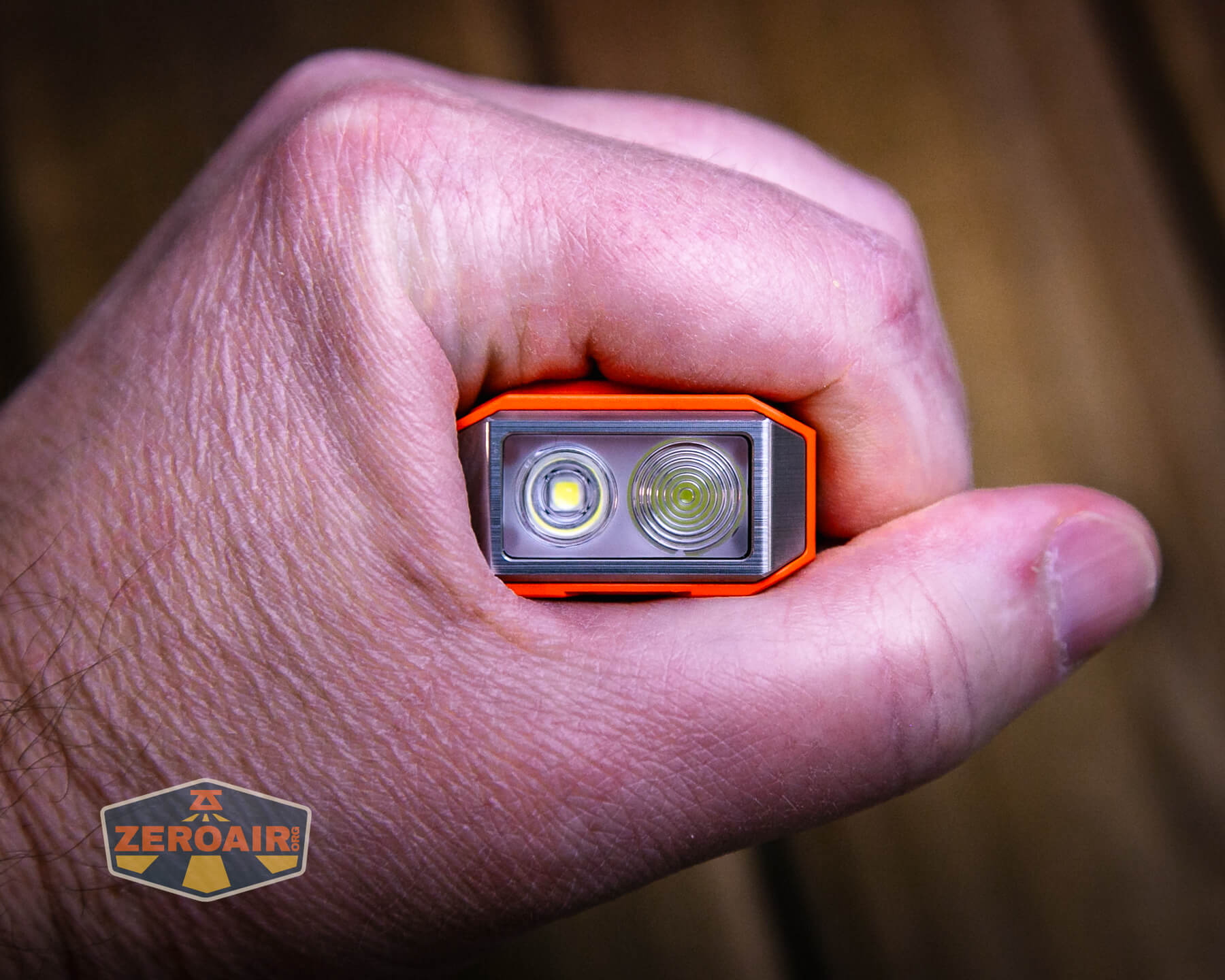 Mateminco TACUBE 3.0 multi-function RGB flashlight in hand
