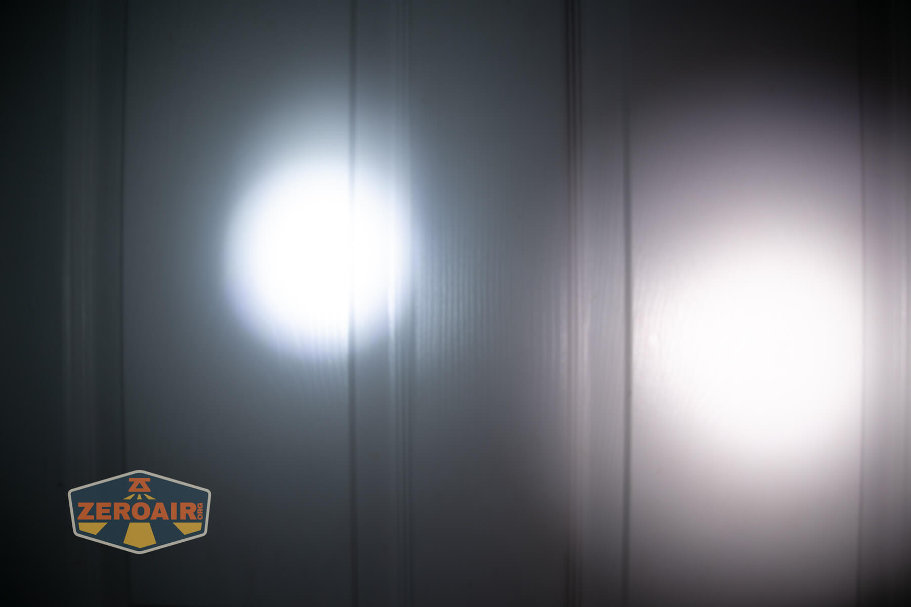 Mateminco TACUBE 3.0 multi-function RGB flashlight beamshots on door (at 1') compared to nichia 219b 4500K