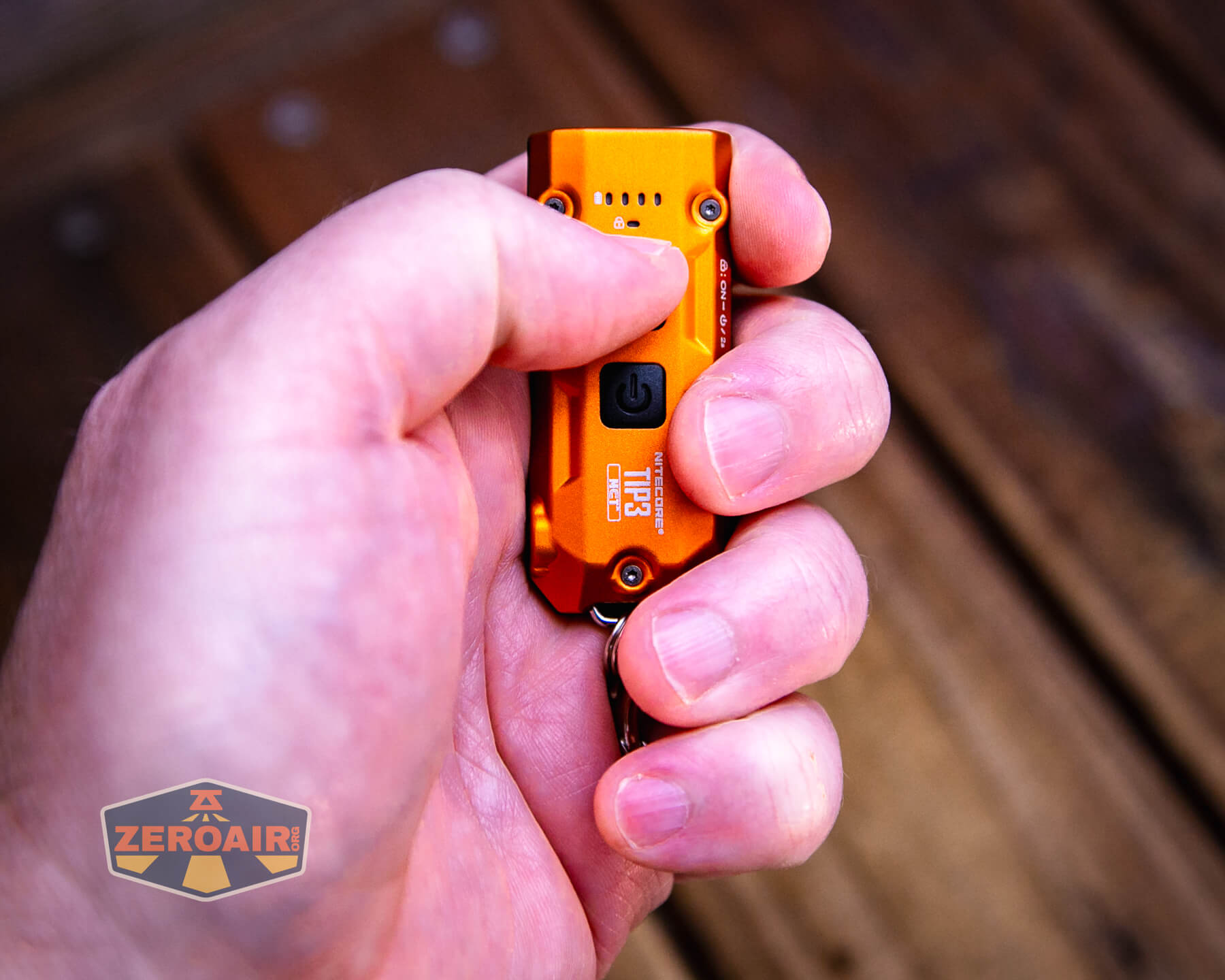 Nitecore TIP3 keychain flashlight in hand