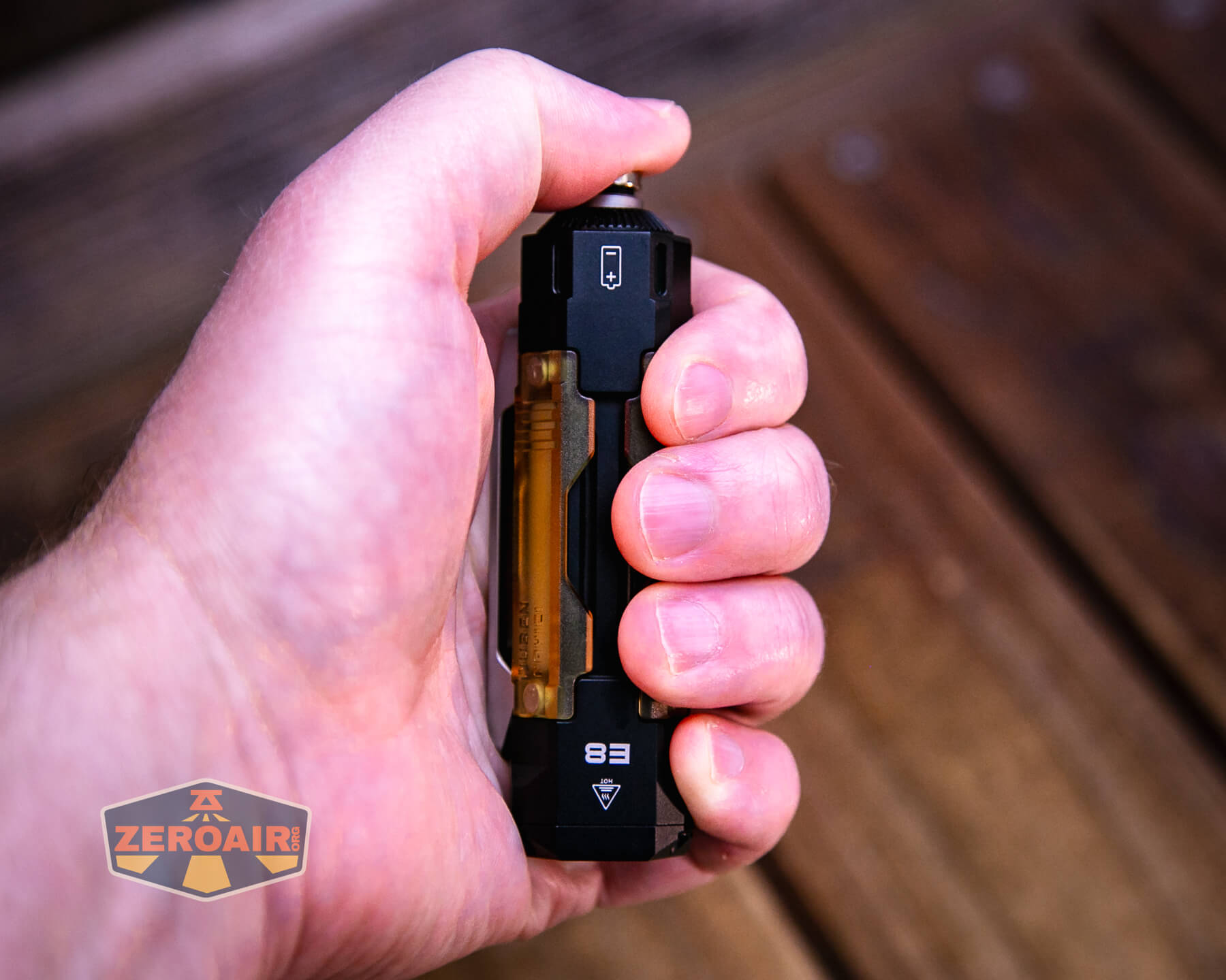 Wuben E Production flashlight in hand