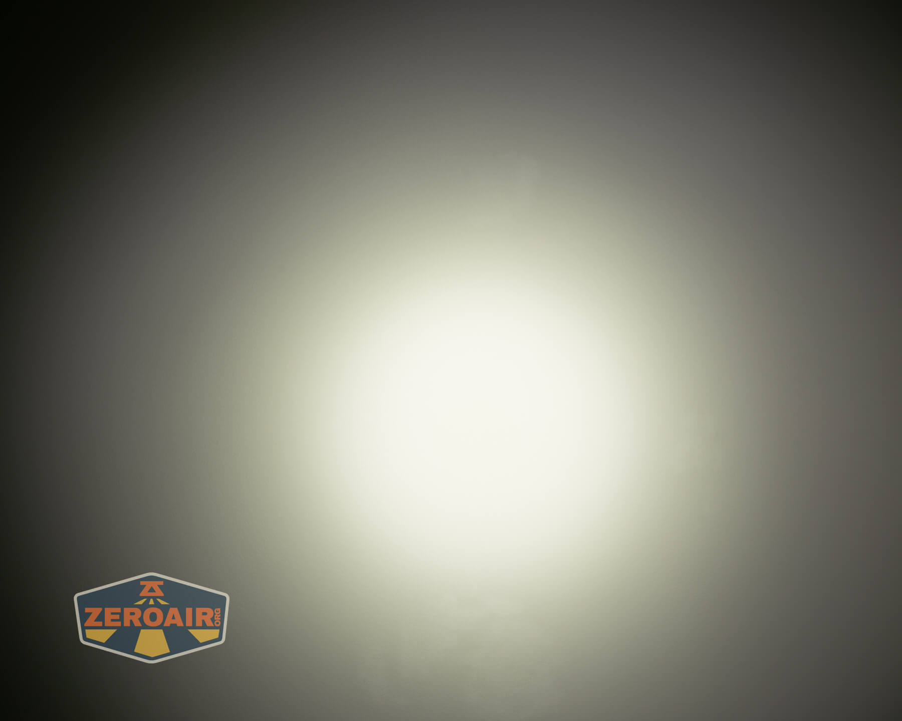 Wuben E Production flashlight beamshots on ceiling